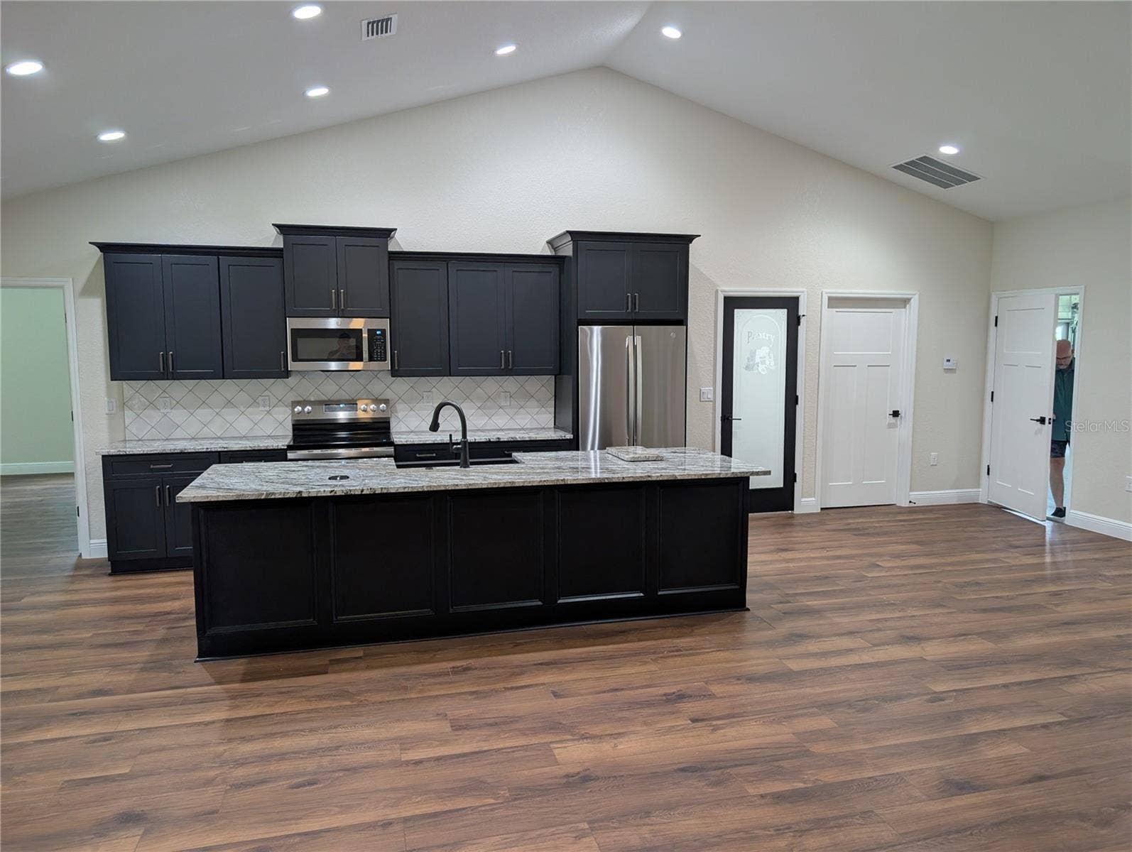 Photos are of same model  Fixtures, colors, flooring will vary