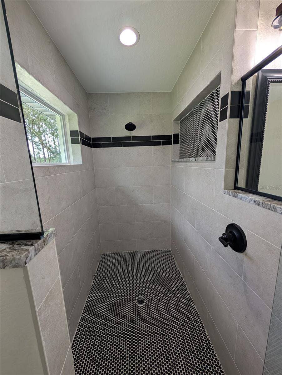 Photos are of same model  Fixtures, colors, flooring will vary
