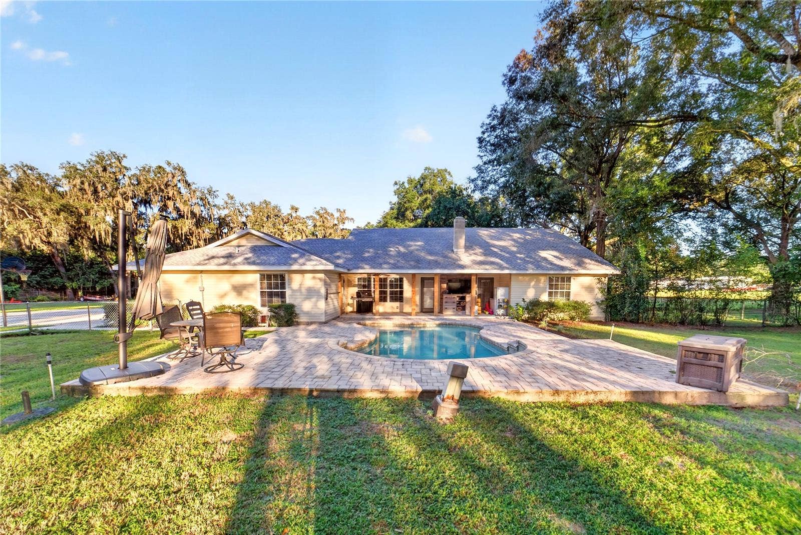 6410 NE 25TH AVENUE, Ocala, FL 34479 Back Porch/Pool Area