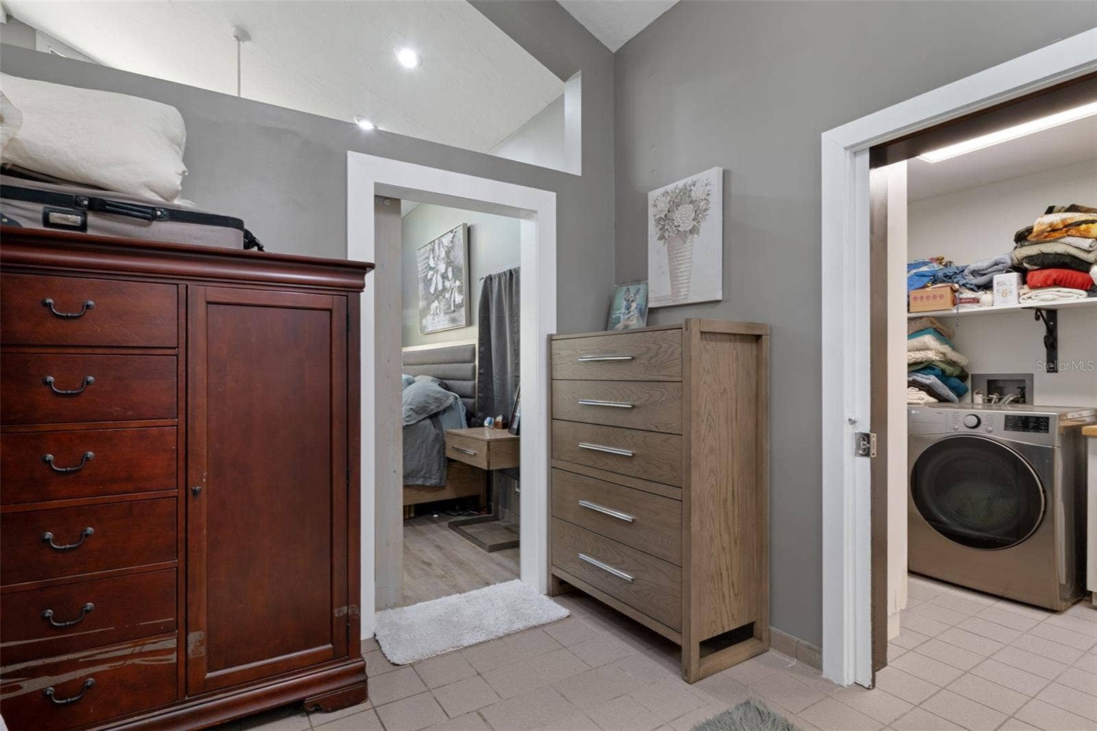 Primary bedroom walk-in closet
