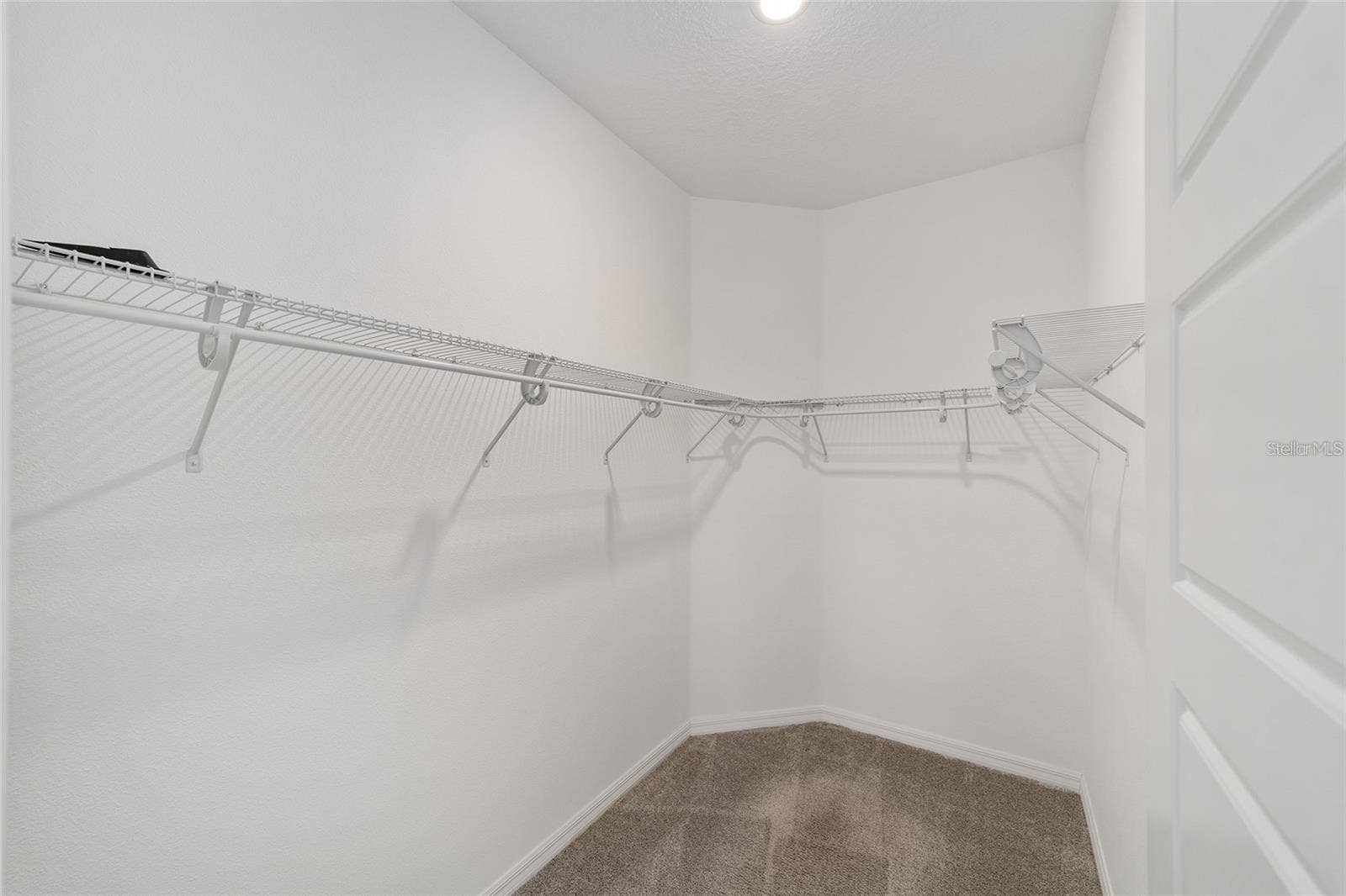 9979 SW 88TH LOOP, Ocala, FL 34481 Primary Bedroom Walk-in Closet