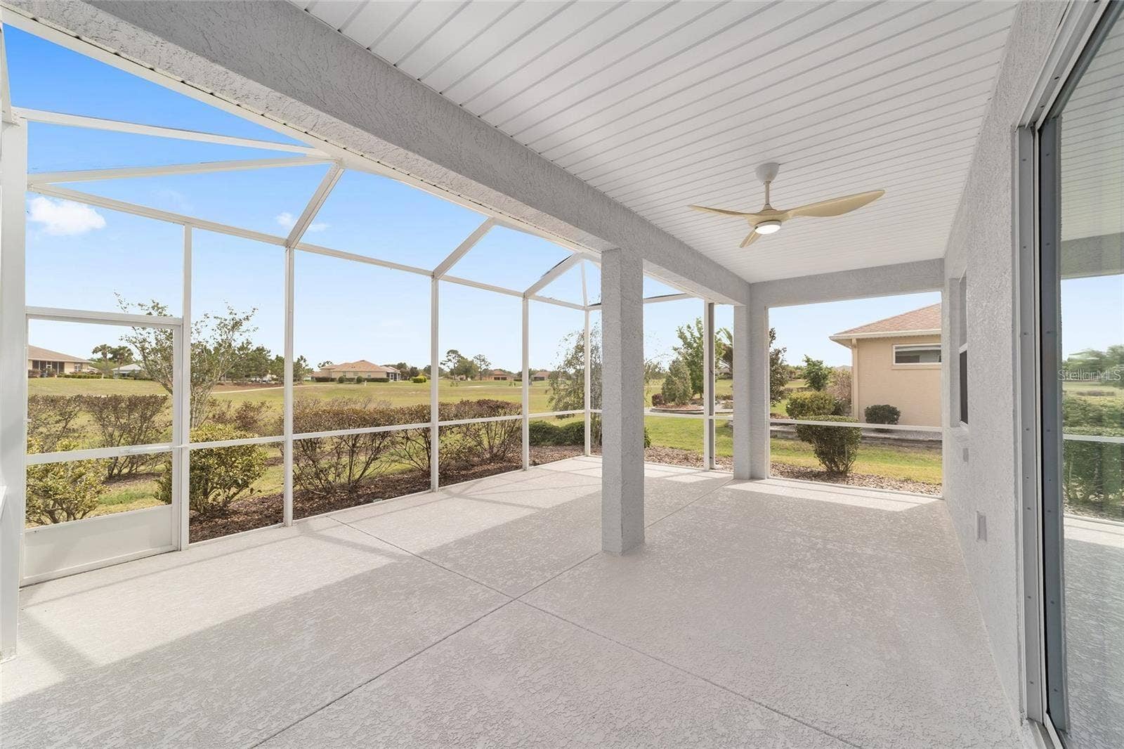 9979 SW 88TH LOOP, Ocala, FL 34481 Caged Lanai With Golf Course View #1