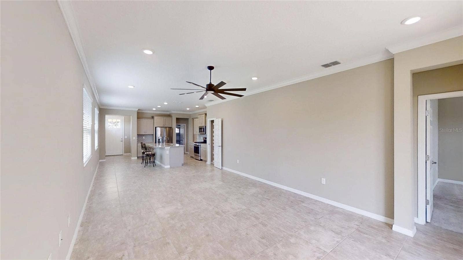 9818 SW 99TH LOOP, Ocala, FL 34481 LIVING ROOM TO KITCHEN