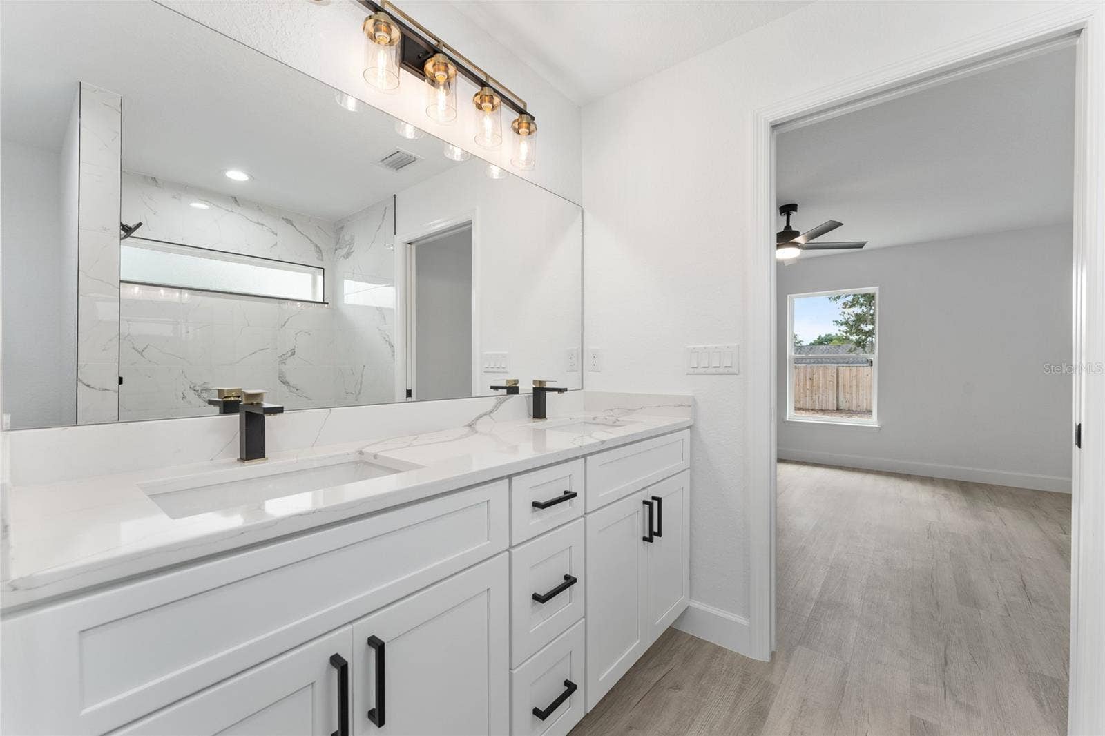 3 PECAN DRIVE TRCE, Ocala, FL 34472 Primary Bathroom. Actual home will not have gold finishes, only black