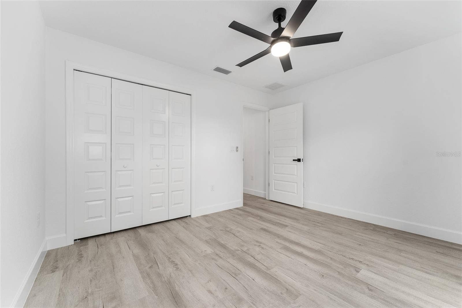 3 PECAN DRIVE TRCE, Ocala, FL 34472 Bedroom 2. Actual home will have colonial-style interior doors versus what is shown.