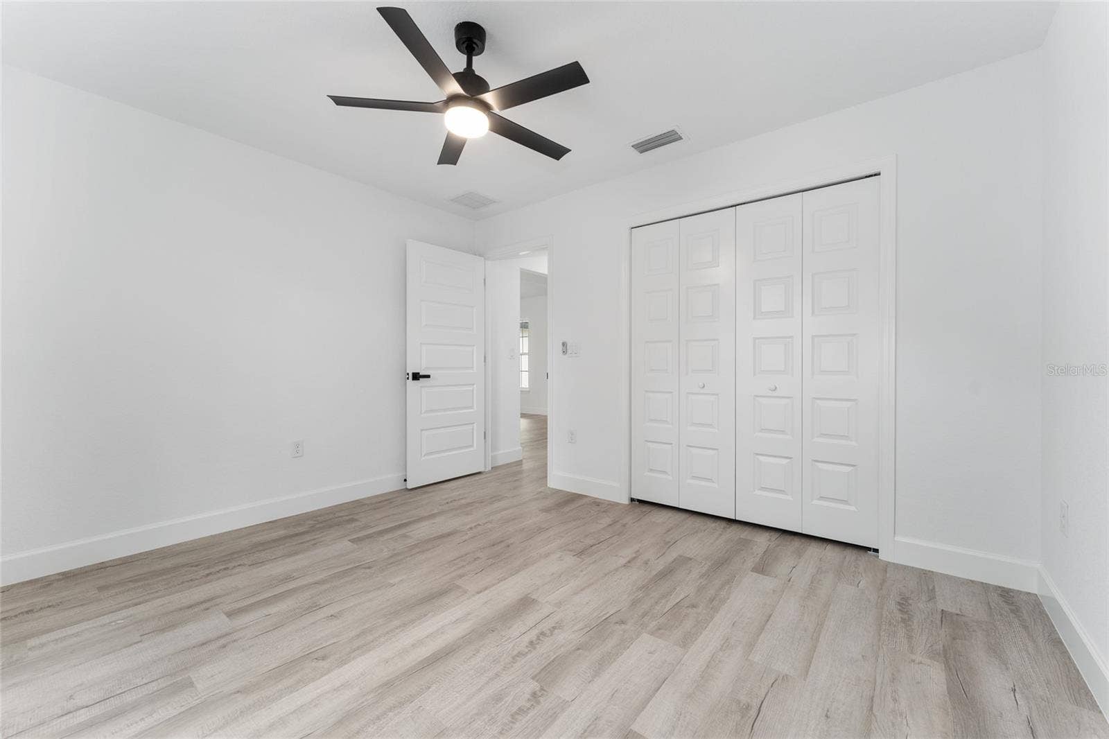 3 PECAN DRIVE TRCE, Ocala, FL 34472 Bedroom 3. Actual home will have colonial-style interior doors versus what is shown.