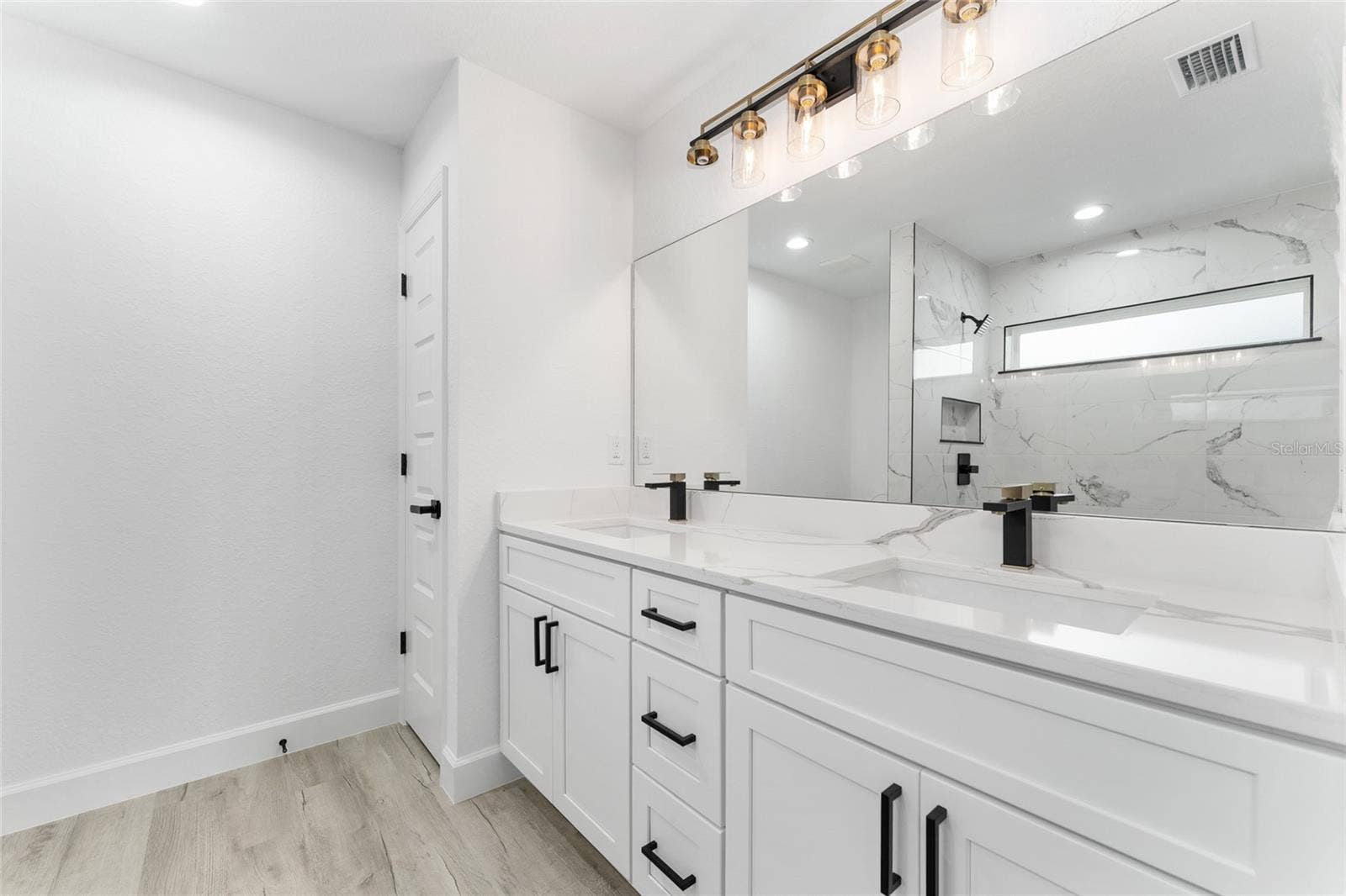 3 PECAN DRIVE TRCE, Ocala, FL 34472 Primary Bathroom. Actual home will not have gold finishes, only black