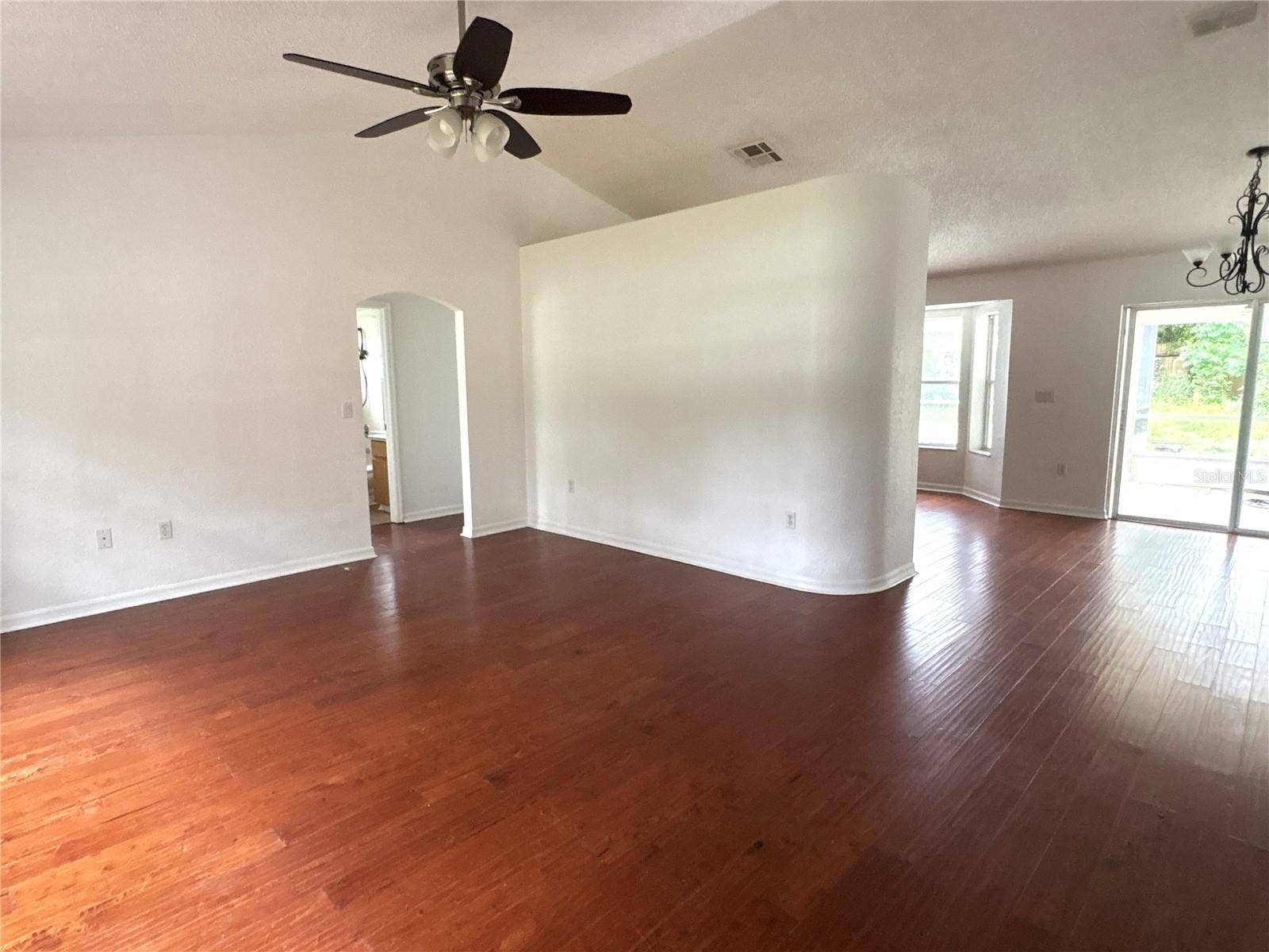8919 N MENDOZA WAY, Citrus Springs, FL 34434 Front door area overlooking living room and access to kitchen