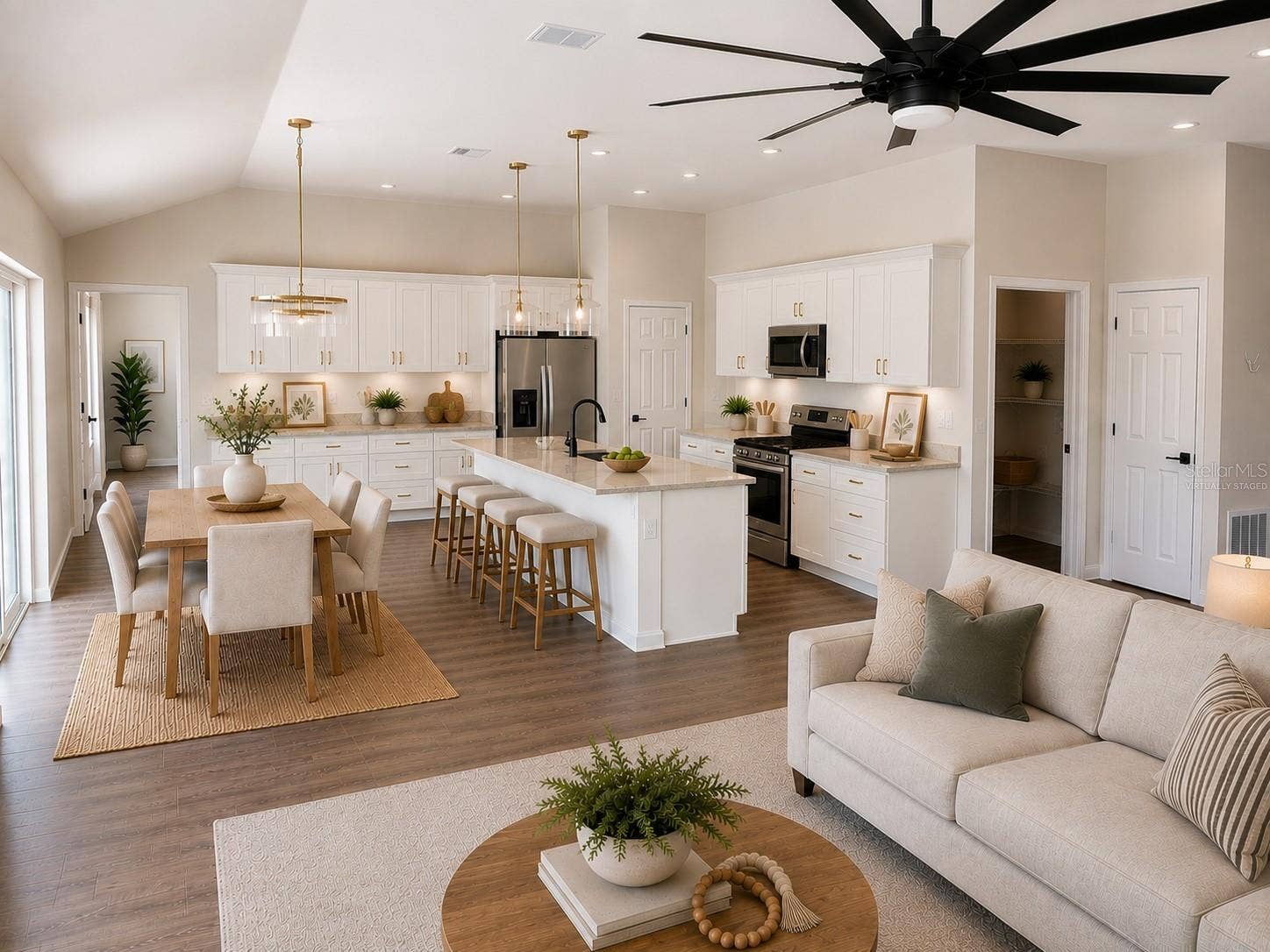 6232 SW 204TH AVENUE, Dunnellon, FL 34431 Virtually staged interior shot from LR to kitchen and dining