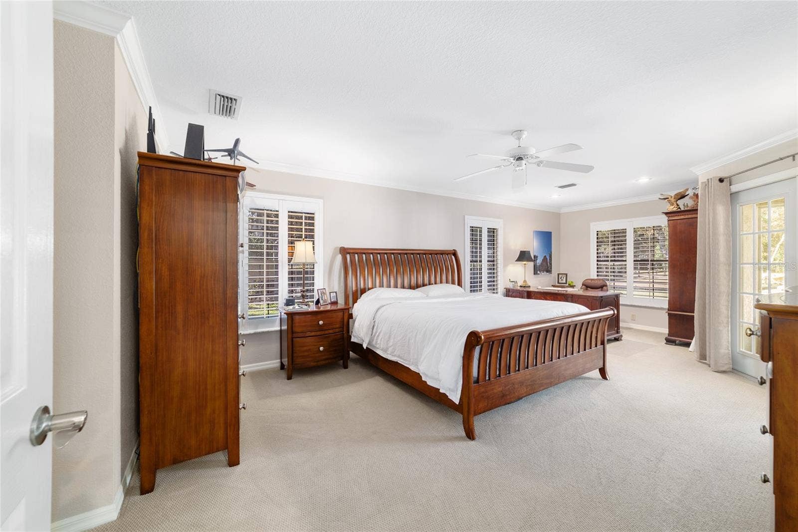 Primary Bedroom with space for an office or workout equipment -Access to the screened in Lani