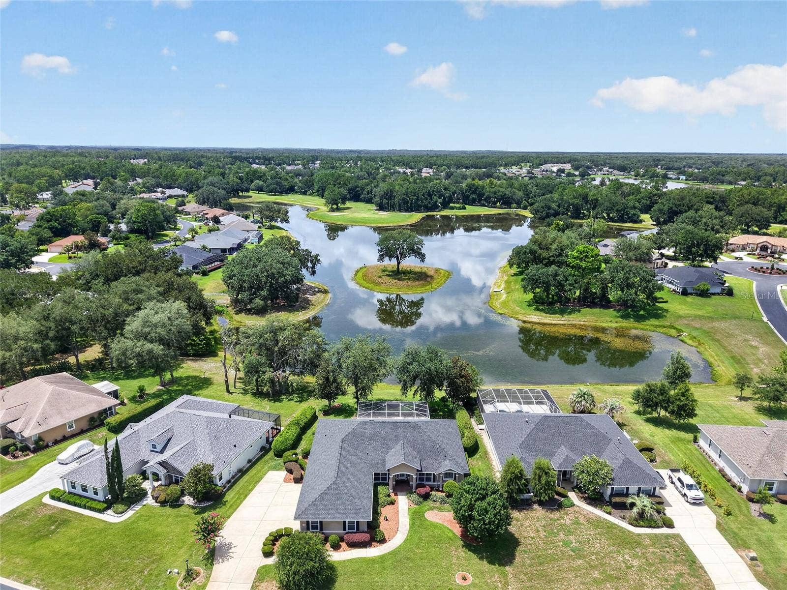 349 LAKE DRIVE, Ocala, FL 34472 Aerial of Home with Lake