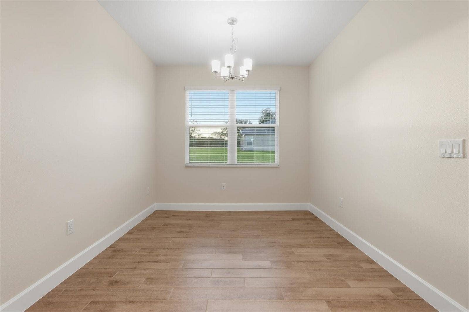 Interior Laundry room. Washer and electric dryer hookups.