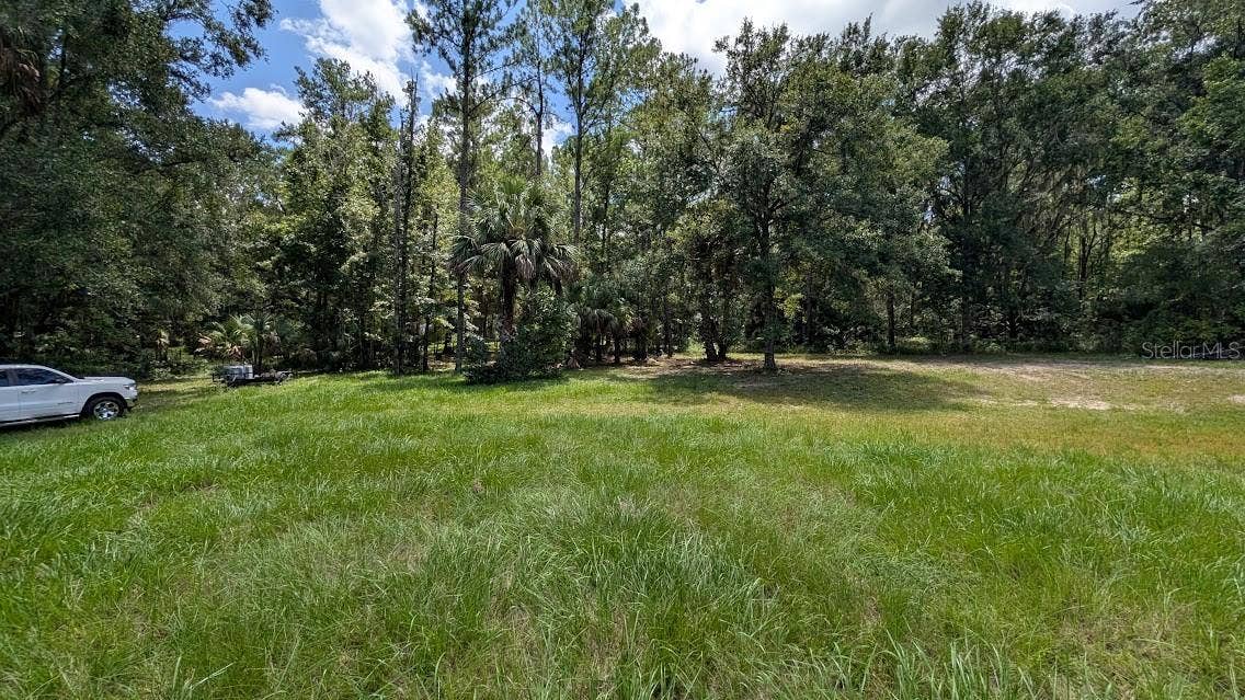 Most of the 1.4 acres is cleared and in grass.  Tree line is on the south side of the property.