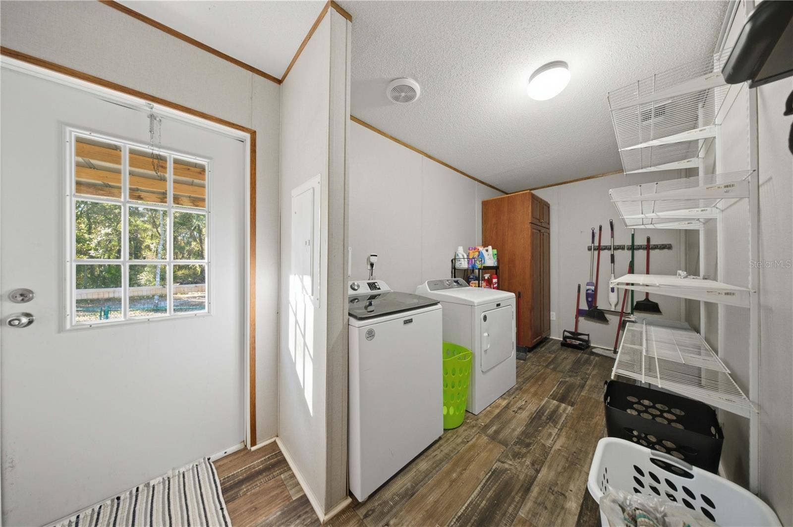9921 SE 160TH AVENUE, Ocklawaha, FL 32179 LAUNDRY ROOM
