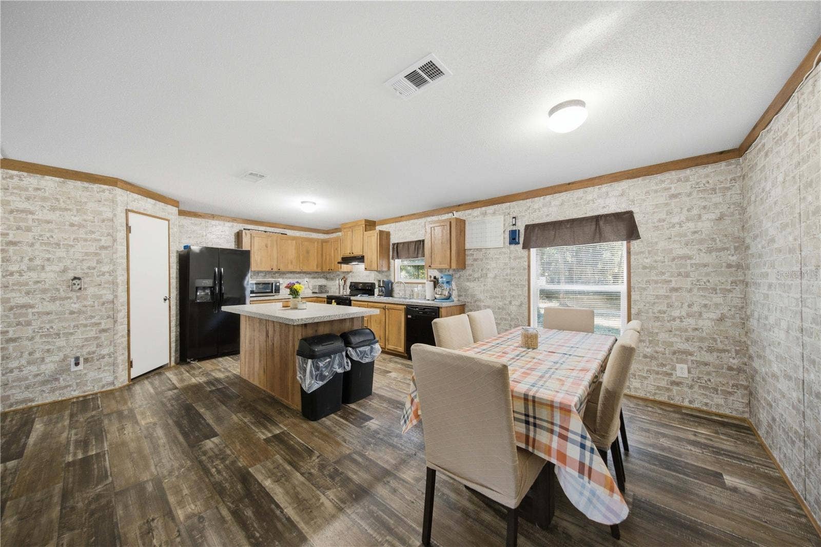 9921 SE 160TH AVENUE, Ocklawaha, FL 32179 KITCHEN/ DINING AREA