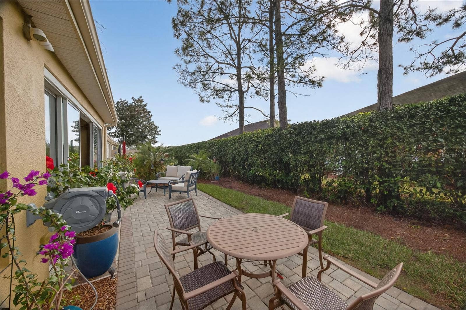 9106 SW 65TH LOOP, Ocala, FL 34481 Back patio area.