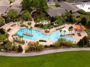 9106 SW 65TH LOOP, Ocala, FL 34481 Resort Style outside pool and an inside lap pool
