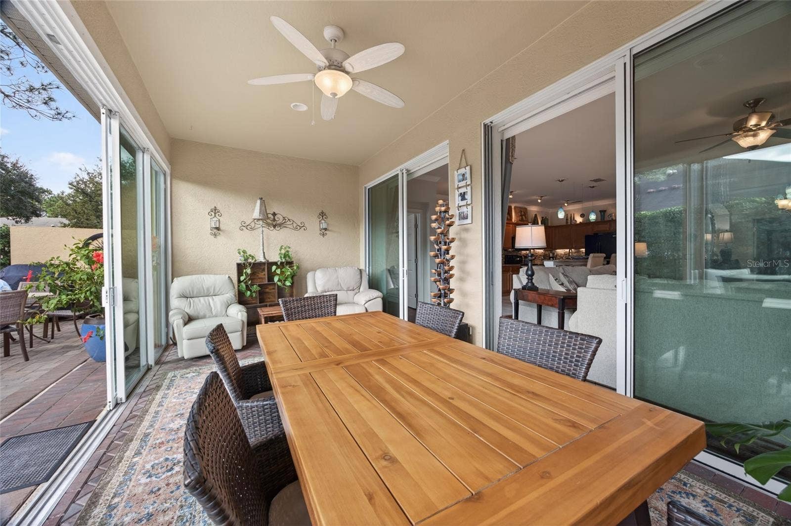 9106 SW 65TH LOOP, Ocala, FL 34481 View of sunroom and private back patio.