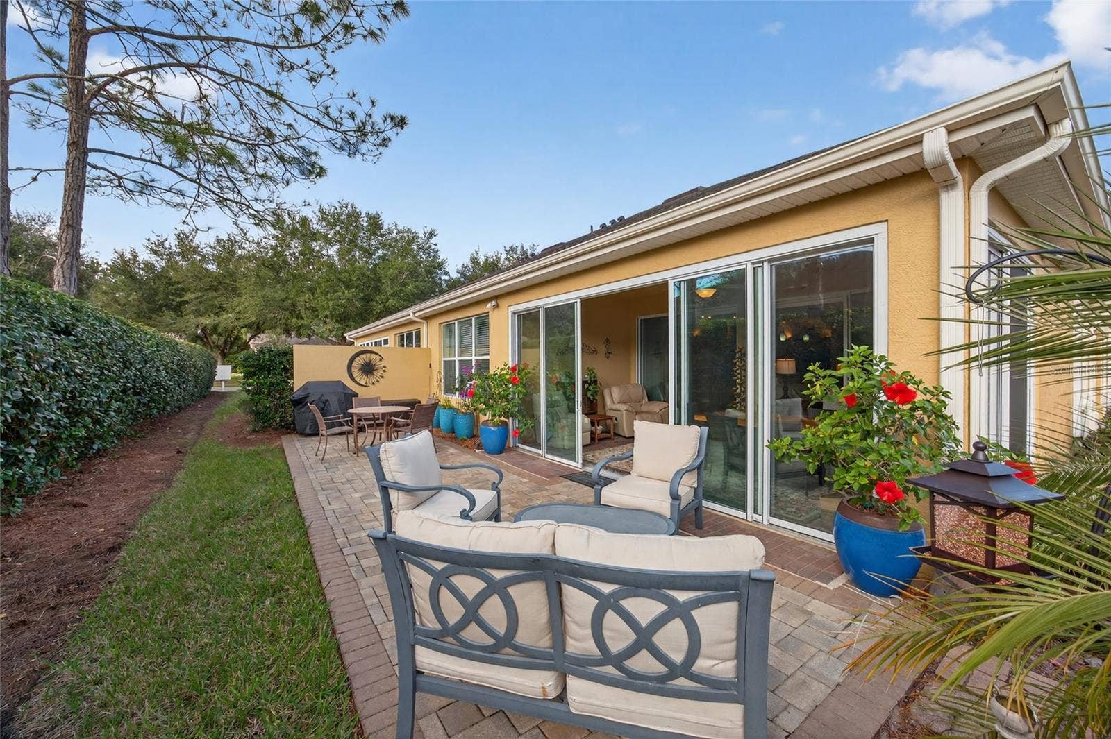 9106 SW 65TH LOOP, Ocala, FL 34481 Private back patio for socializing and relaxing.