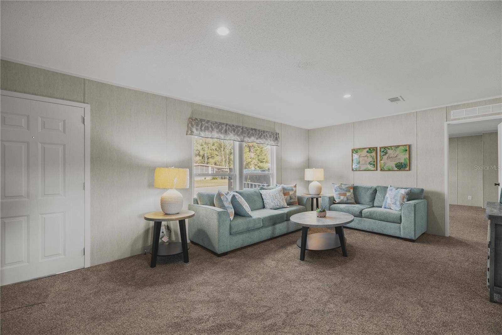 1560 NE 162ND STREET, Citra, FL 32113 Enter into the bright living room with vaulted ceilings