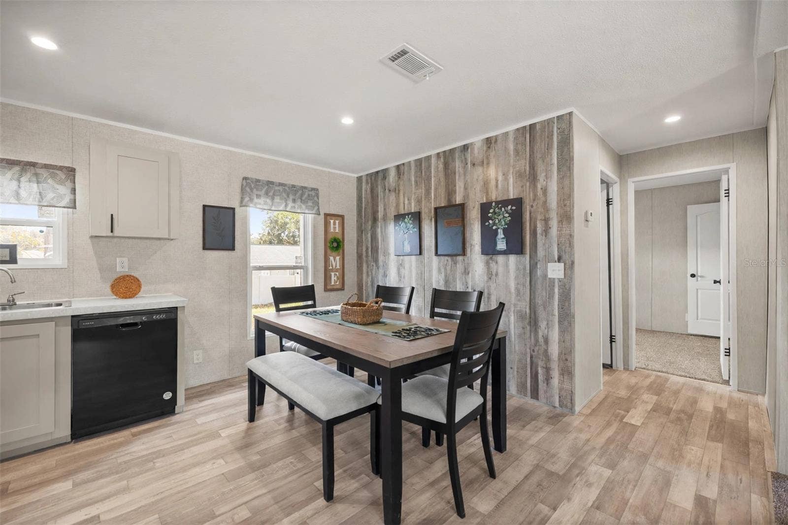 1560 NE 162ND STREET, Citra, FL 32113 Dining Room open to kitchen with Wood look wall