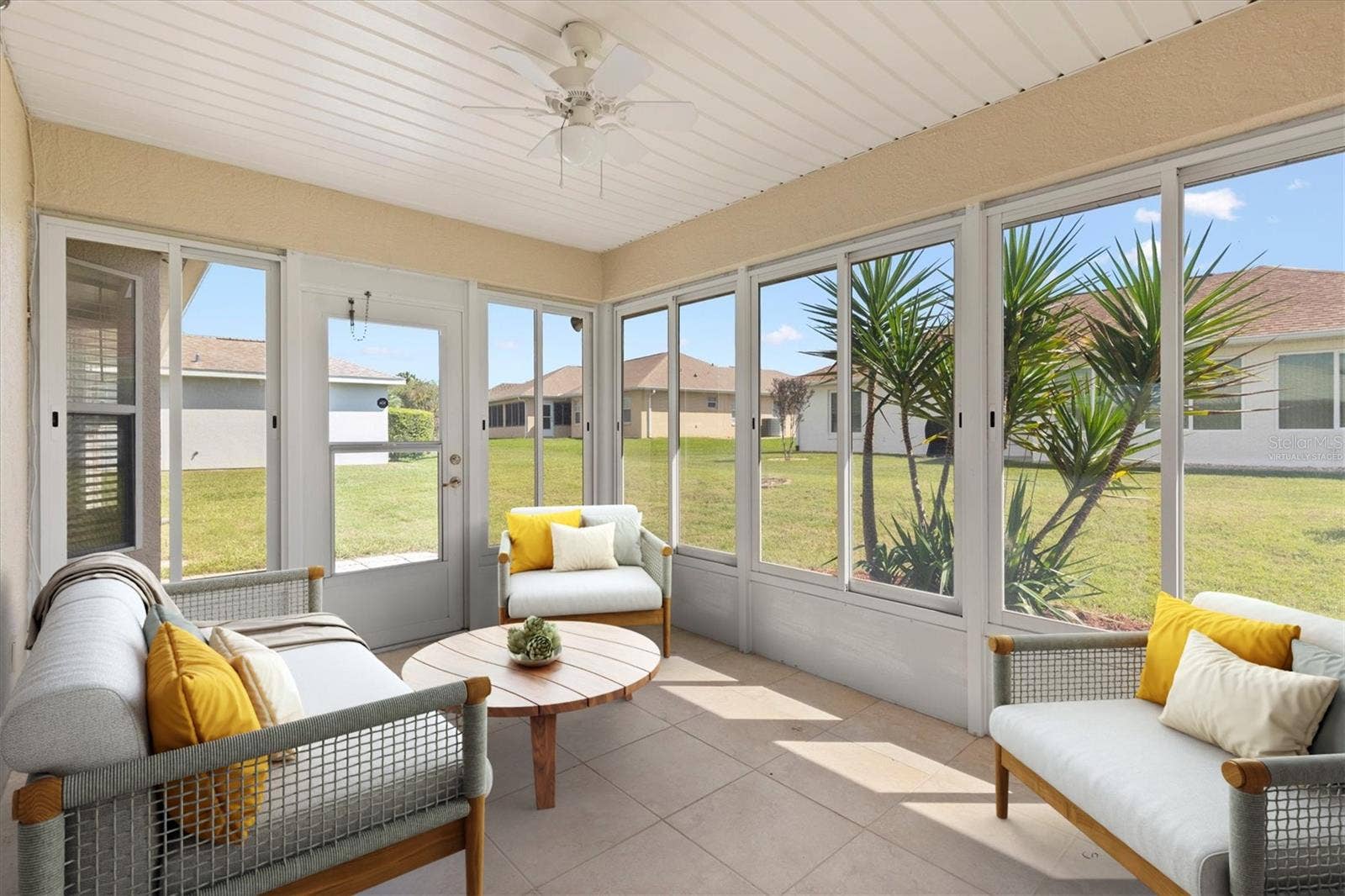 17501 SE 110TH COURT, Summerfield, FL 34491 Virtually staged enclosed lanai.