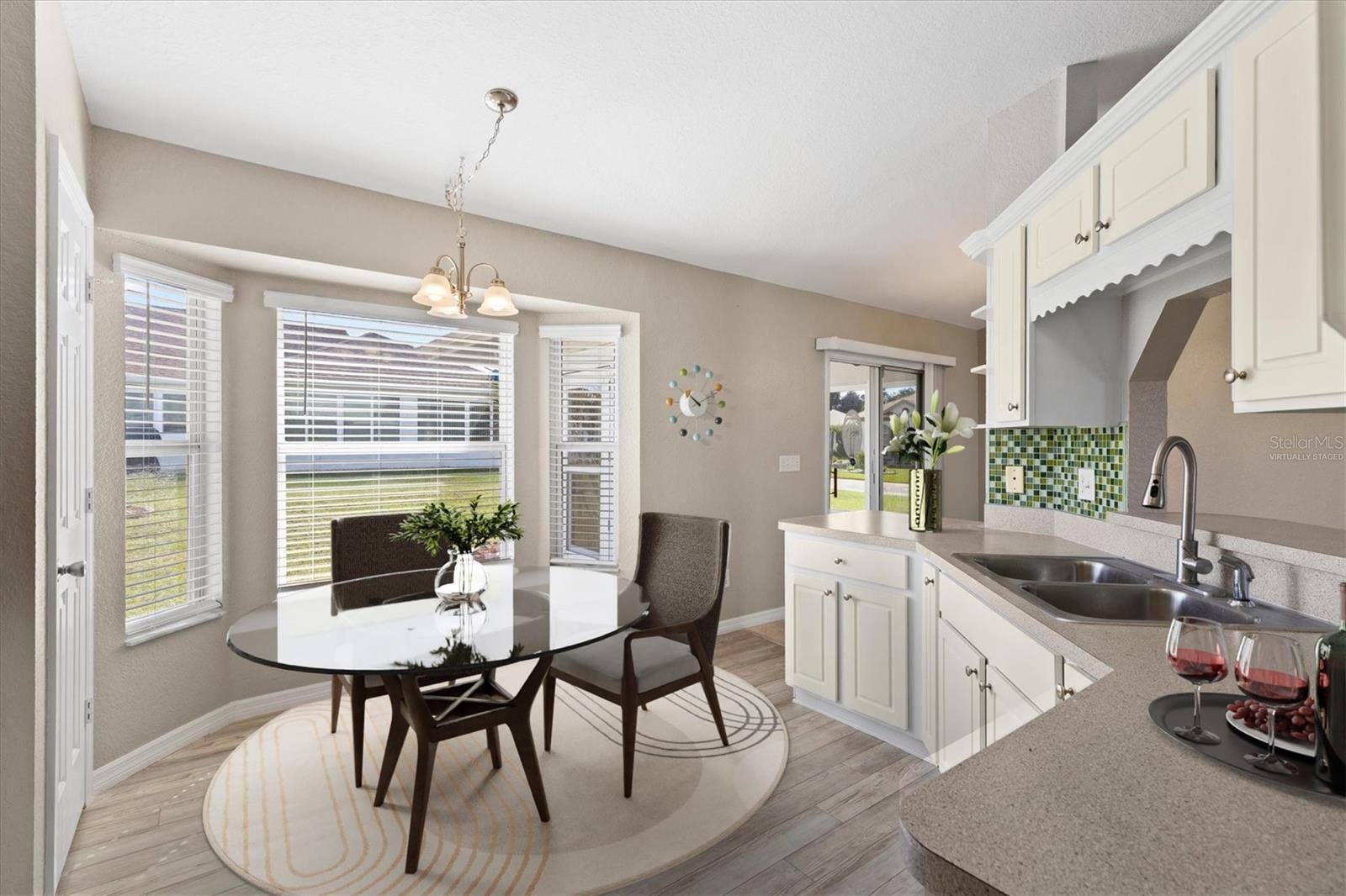 17501 SE 110TH COURT, Summerfield, FL 34491 Virtually staged eat-in kitchen.