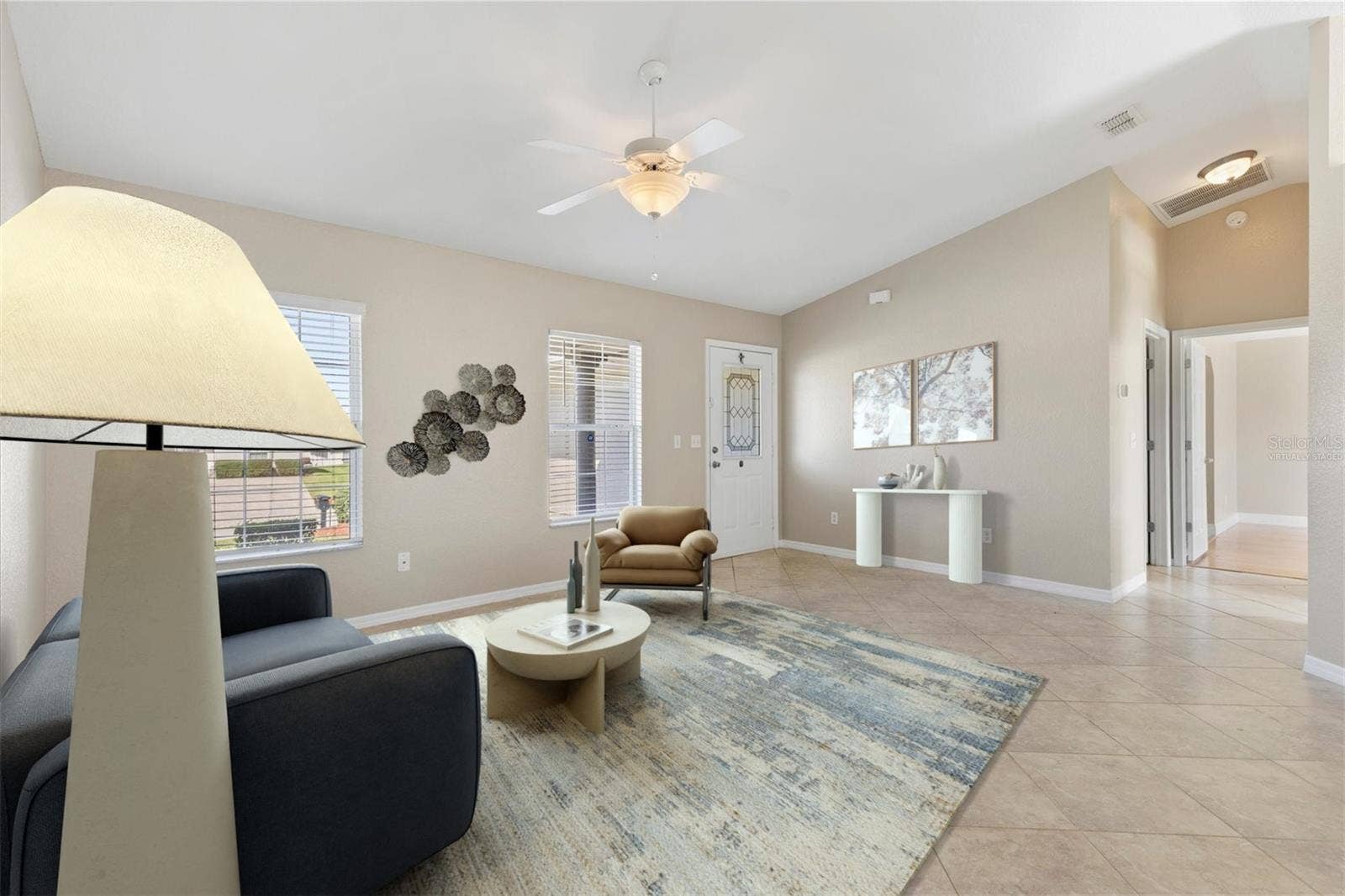17501 SE 110TH COURT, Summerfield, FL 34491 Virtually staged living room.