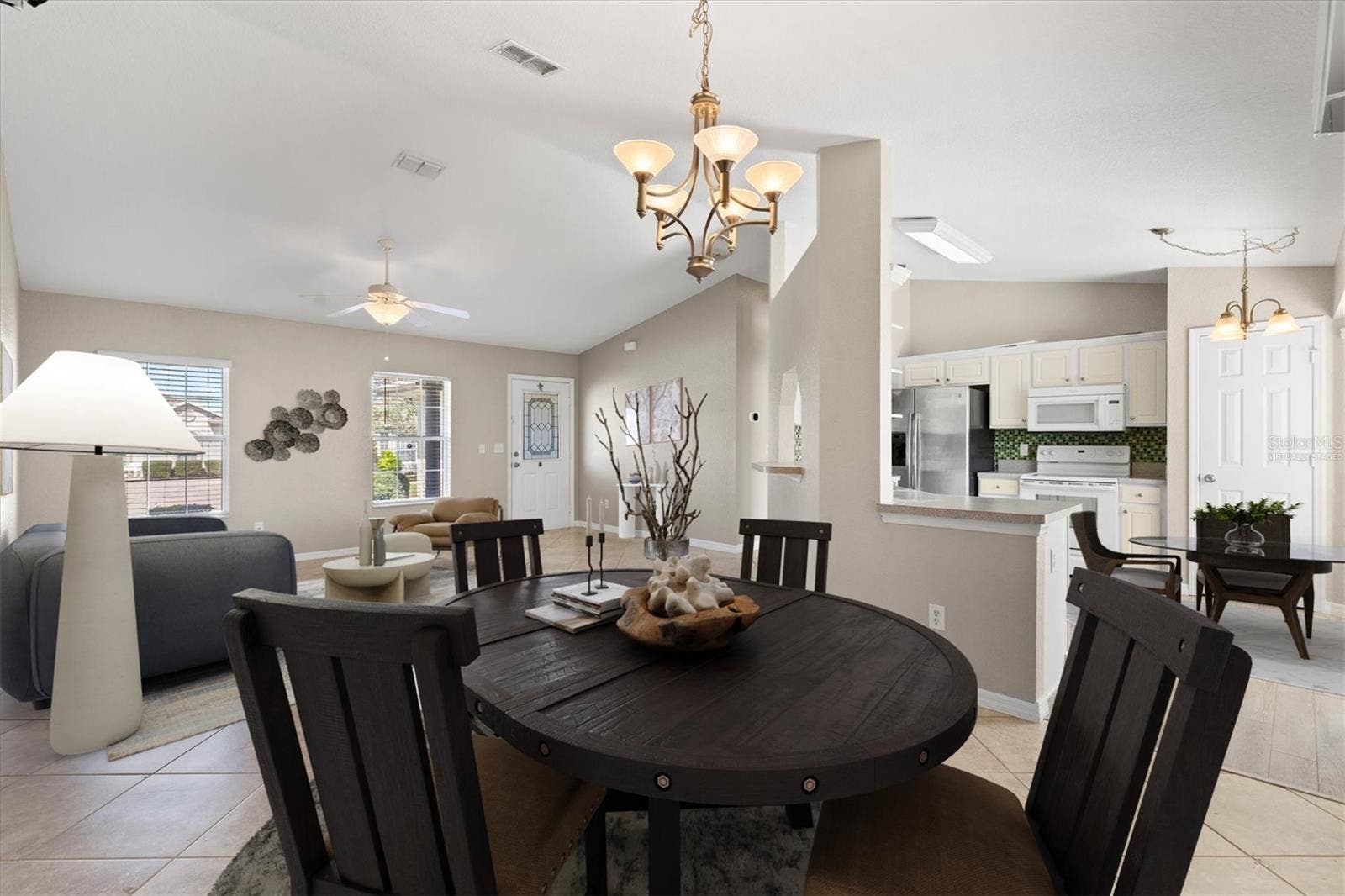 17501 SE 110TH COURT, Summerfield, FL 34491 Virtually staged dining room and living room.