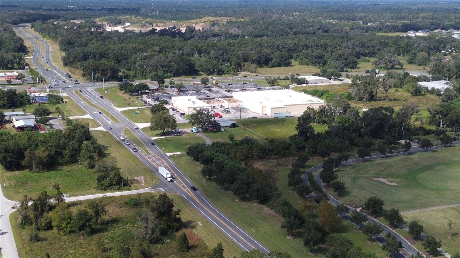 NW 70TH STREET, Ocala, FL 34475 VIEW IS DIRECTLY ABOVE THE VACANT LOT SHOWING DISTINCE TO SHOPPING CENTER