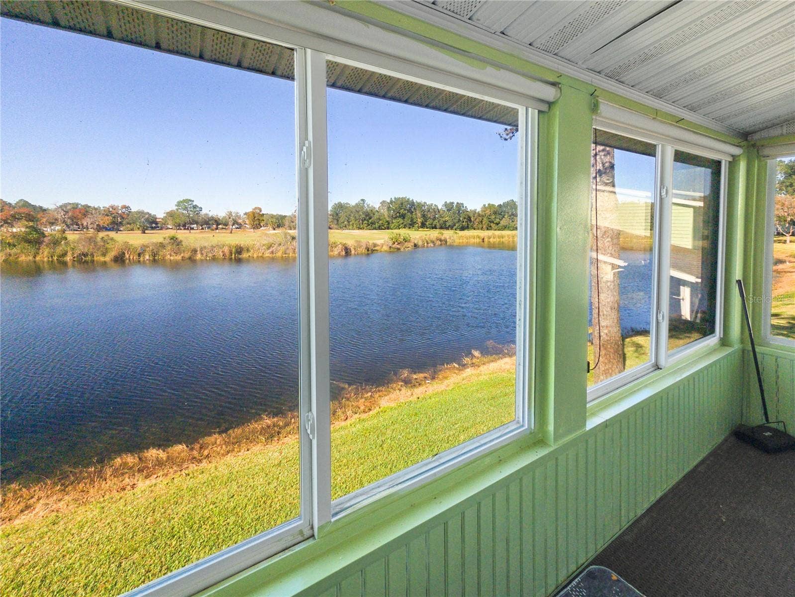487 MIDWAY DRIVE, #B, Ocala, FL 34472 Enclosed Lanai