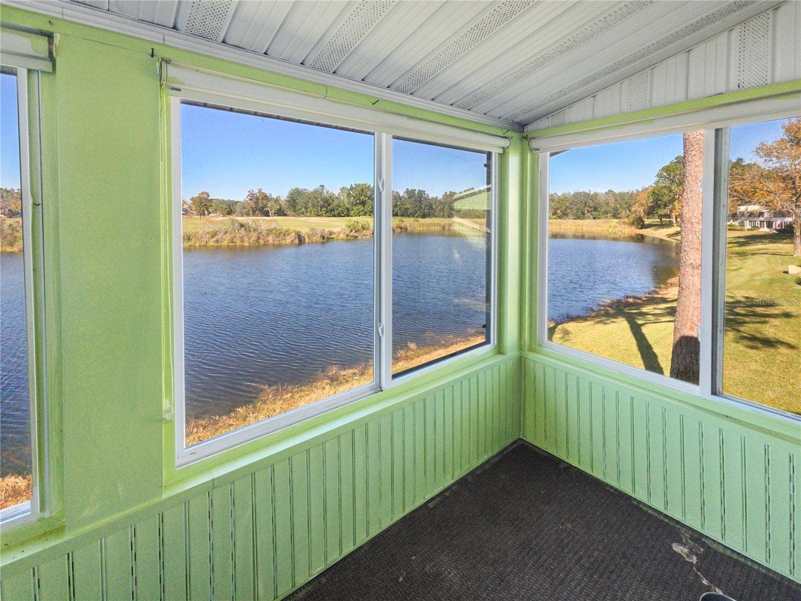 487 MIDWAY DRIVE, #B, Ocala, FL 34472 Enclosed Lanai