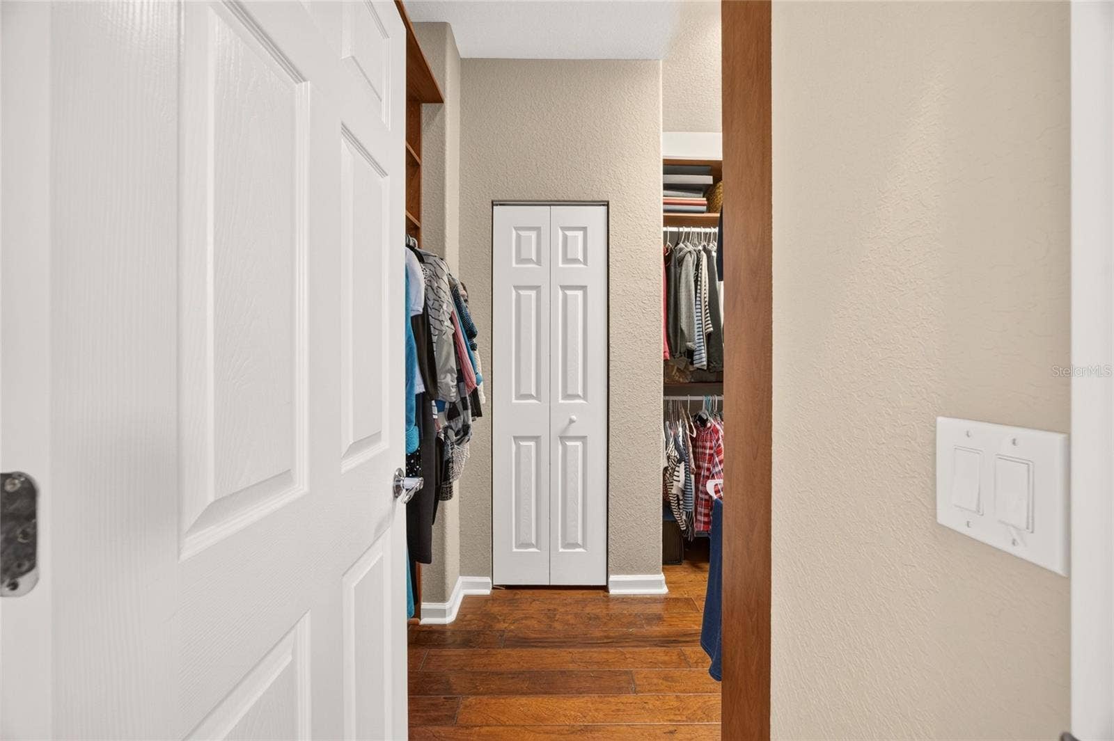 Primary dressing room and walk in closet
