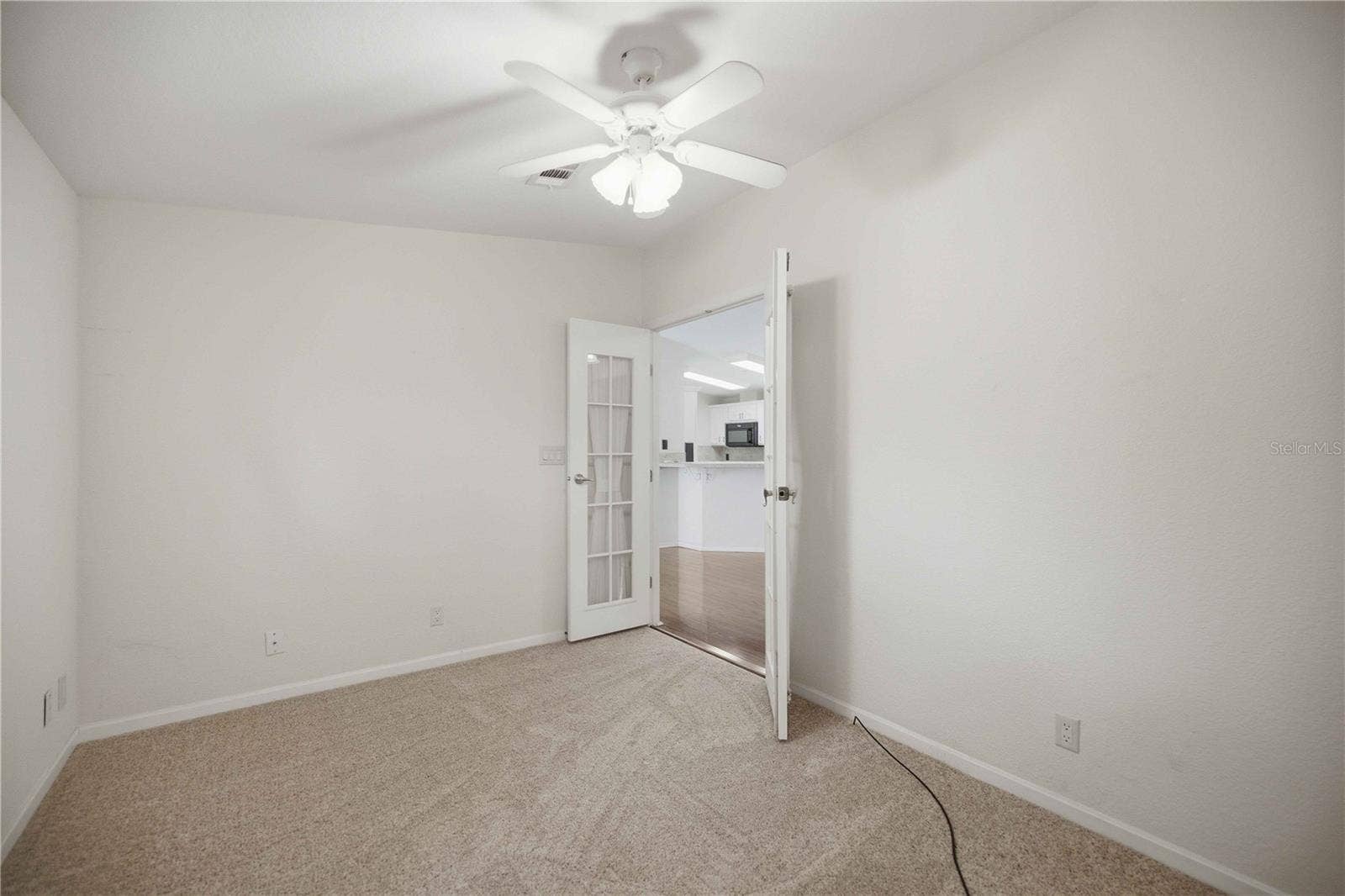 7863 SW 5TH PLACE, Ocala, FL 34474 Second bedroom w/ French doord