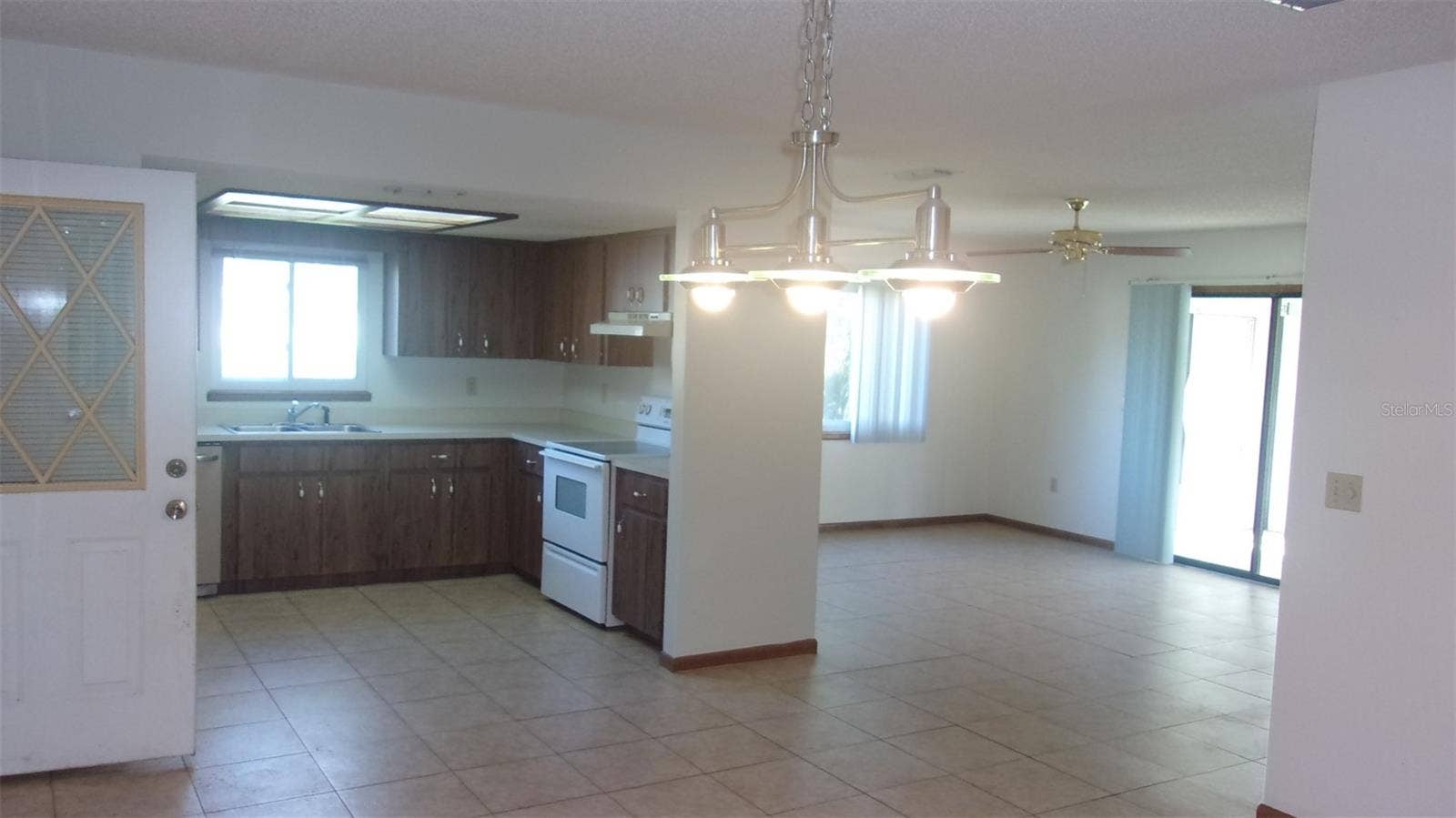 Dining Room to Living Room and Kitchen