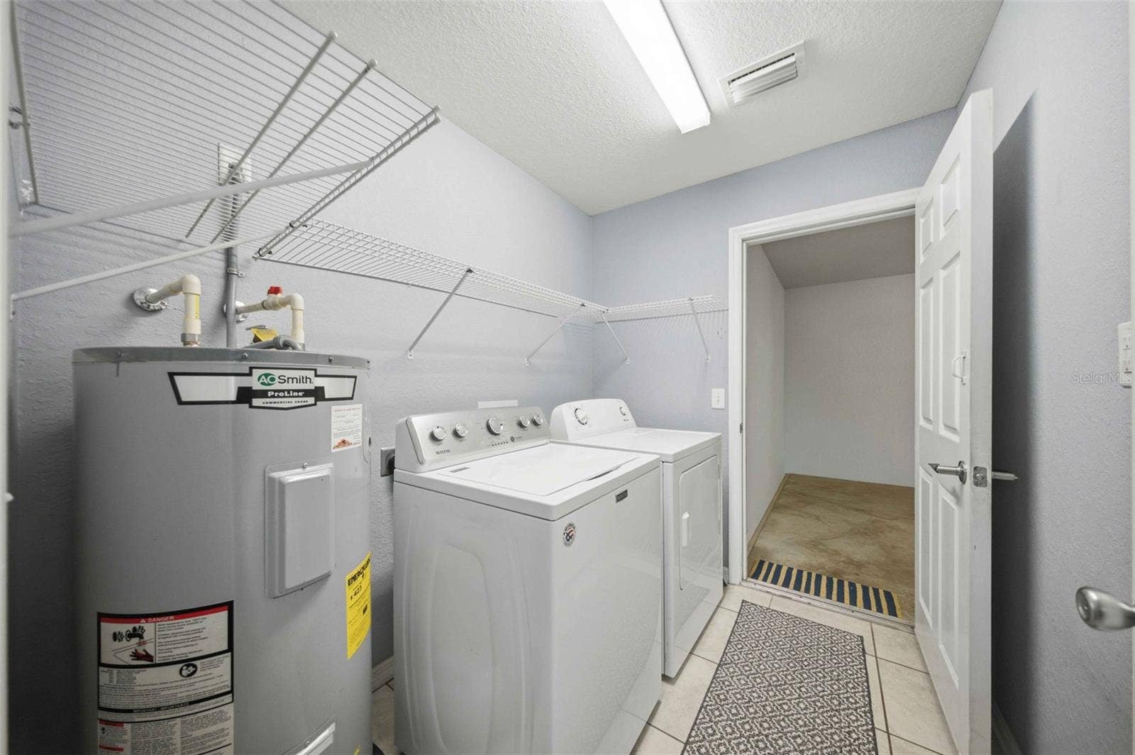 5931 NW 62ND PLACE, Ocala, FL 34482 Inside Laundry