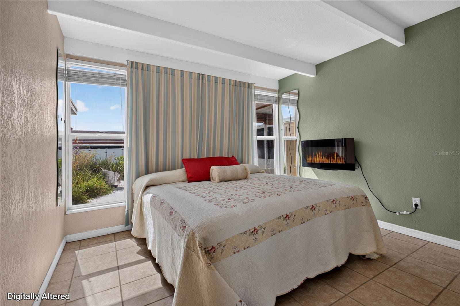 4409 CLUB CIRCLE, Lake Wales, FL 33898 Master bedroom has 2 sidelights on either side of the bed which provides natural light into the home.