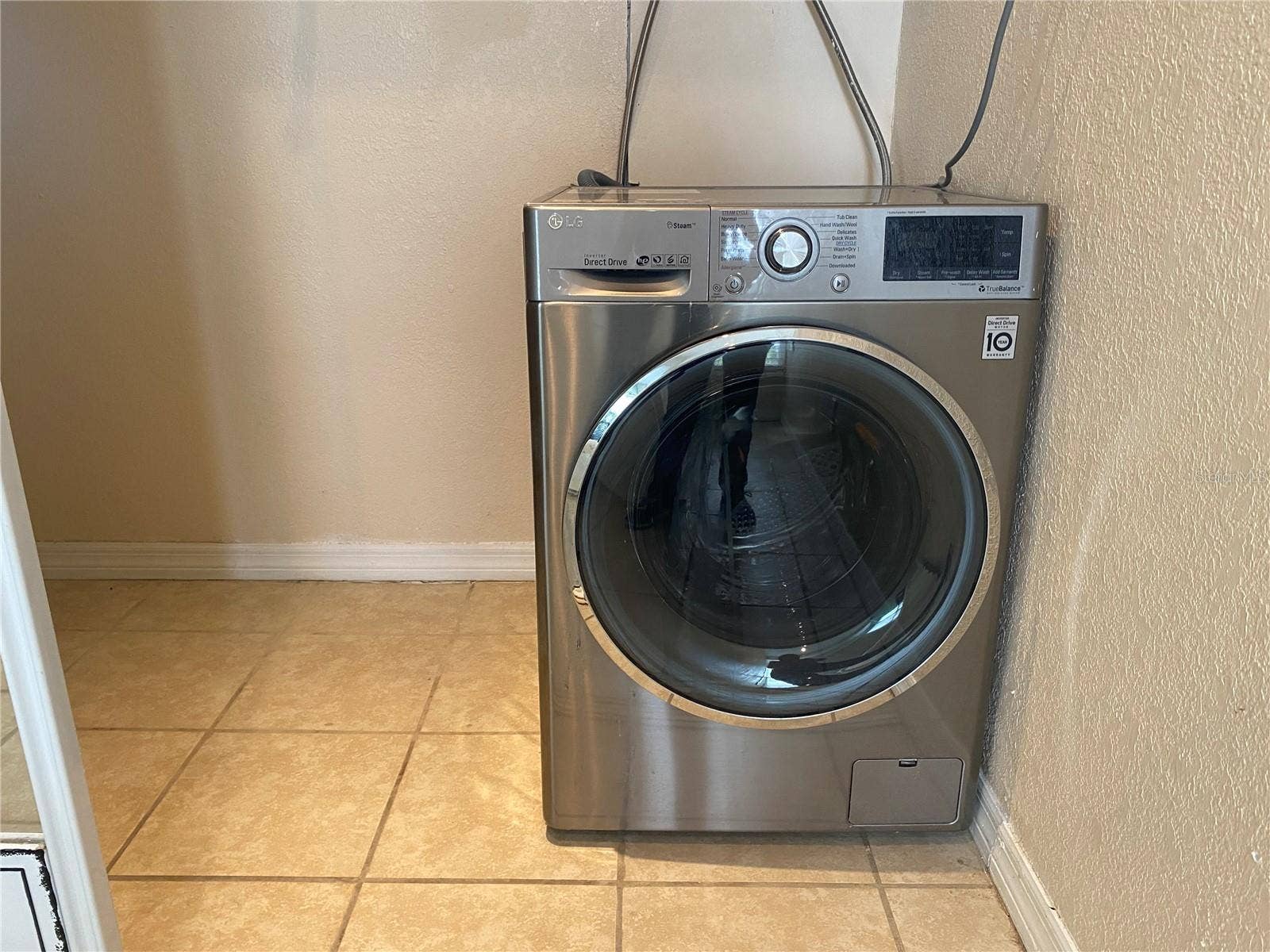 4409 CLUB CIRCLE, Lake Wales, FL 33898 The combination washer/dryer appliance is located in the bedroom closet and will stay in the home and provides at home laundry instead of having to go to a laundromat.