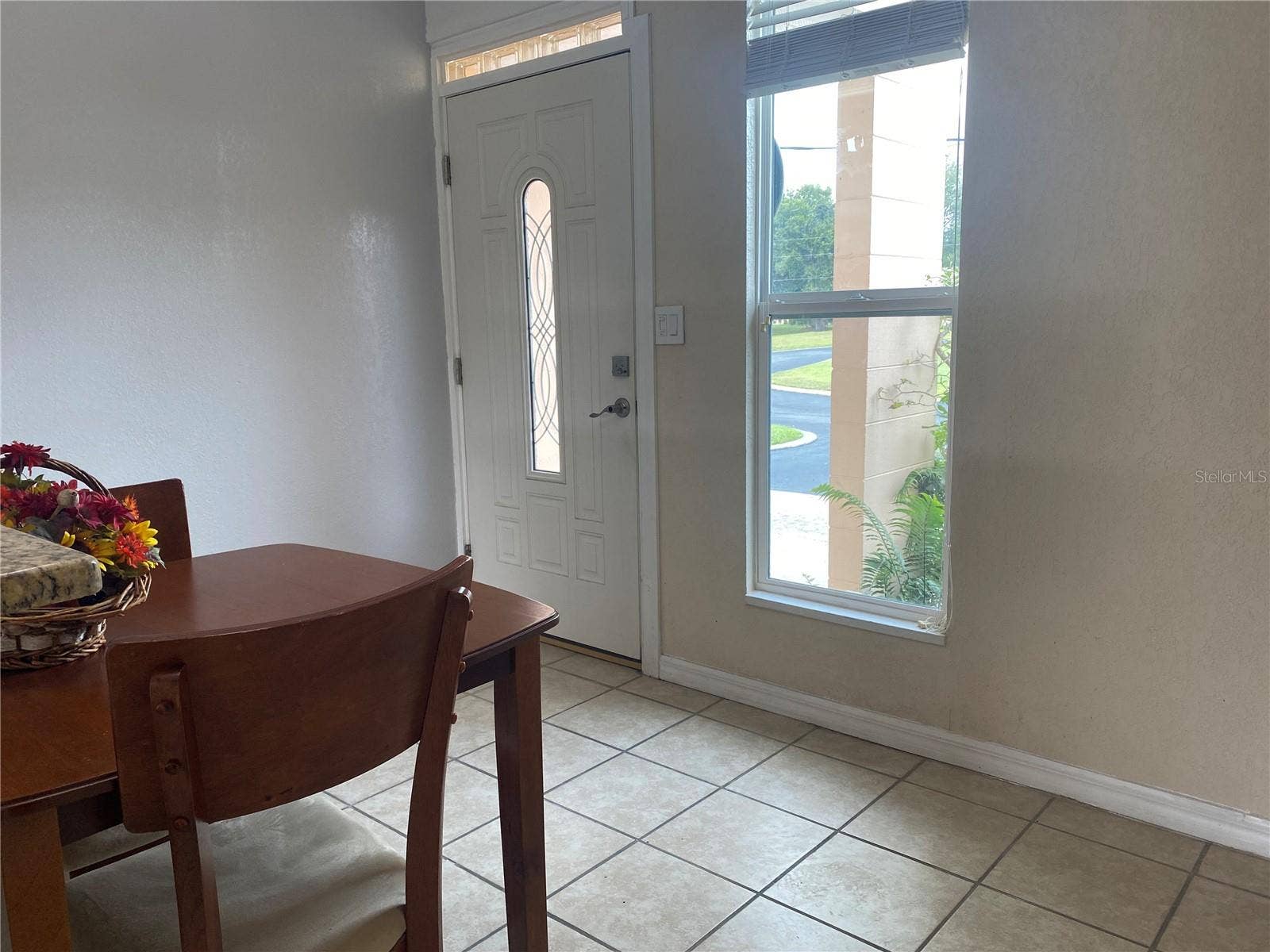 4409 CLUB CIRCLE, Lake Wales, FL 33898 The front door has a lead glass insert and the home has new double pane windows.