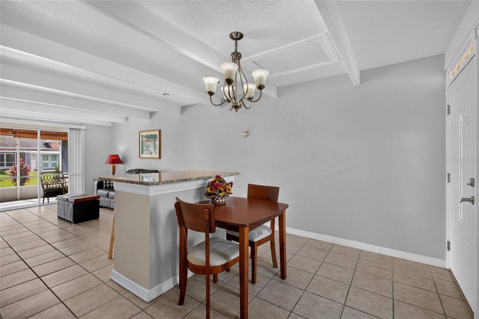 4409 CLUB CIRCLE, Lake Wales, FL 33898 Open floor plan. High ceilings. Lots of natural light filters into the home. Granite on the breakfast bar and ceramic tile flooring.