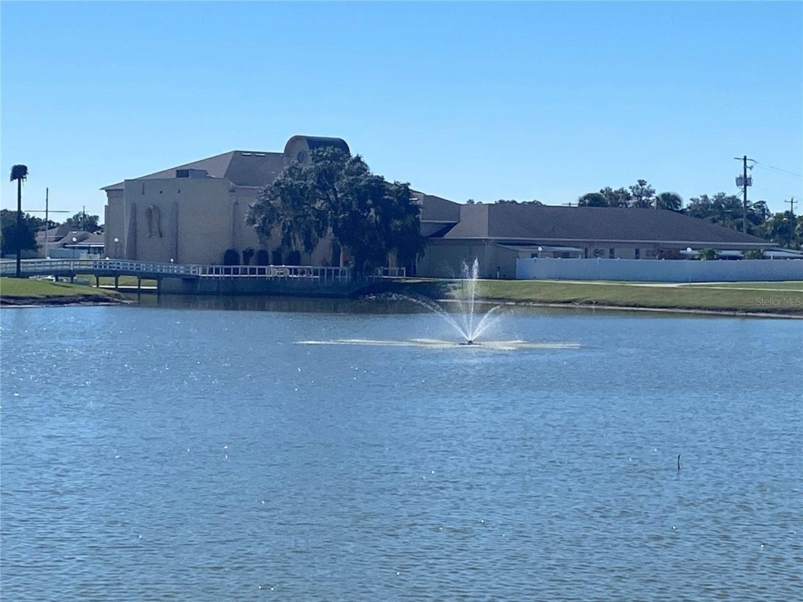 4409 CLUB CIRCLE, Lake Wales, FL 33898 Taken from the walking path looking back to the clubhouse. Waterviews are always peaceful and relaxing.
