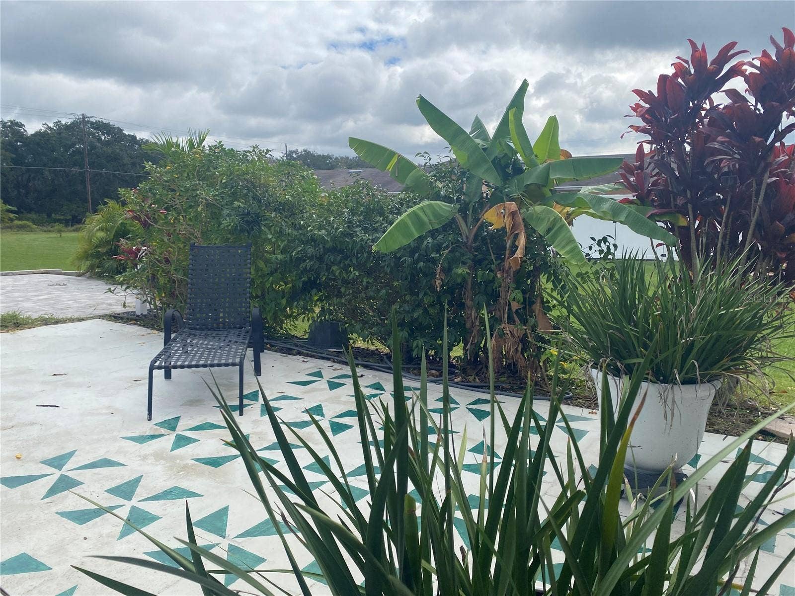 4409 CLUB CIRCLE, Lake Wales, FL 33898 Youll also love the private courtyard with a concrete patio and mature landscaping an ideal spot for your morning coffee or evening glass of wine.