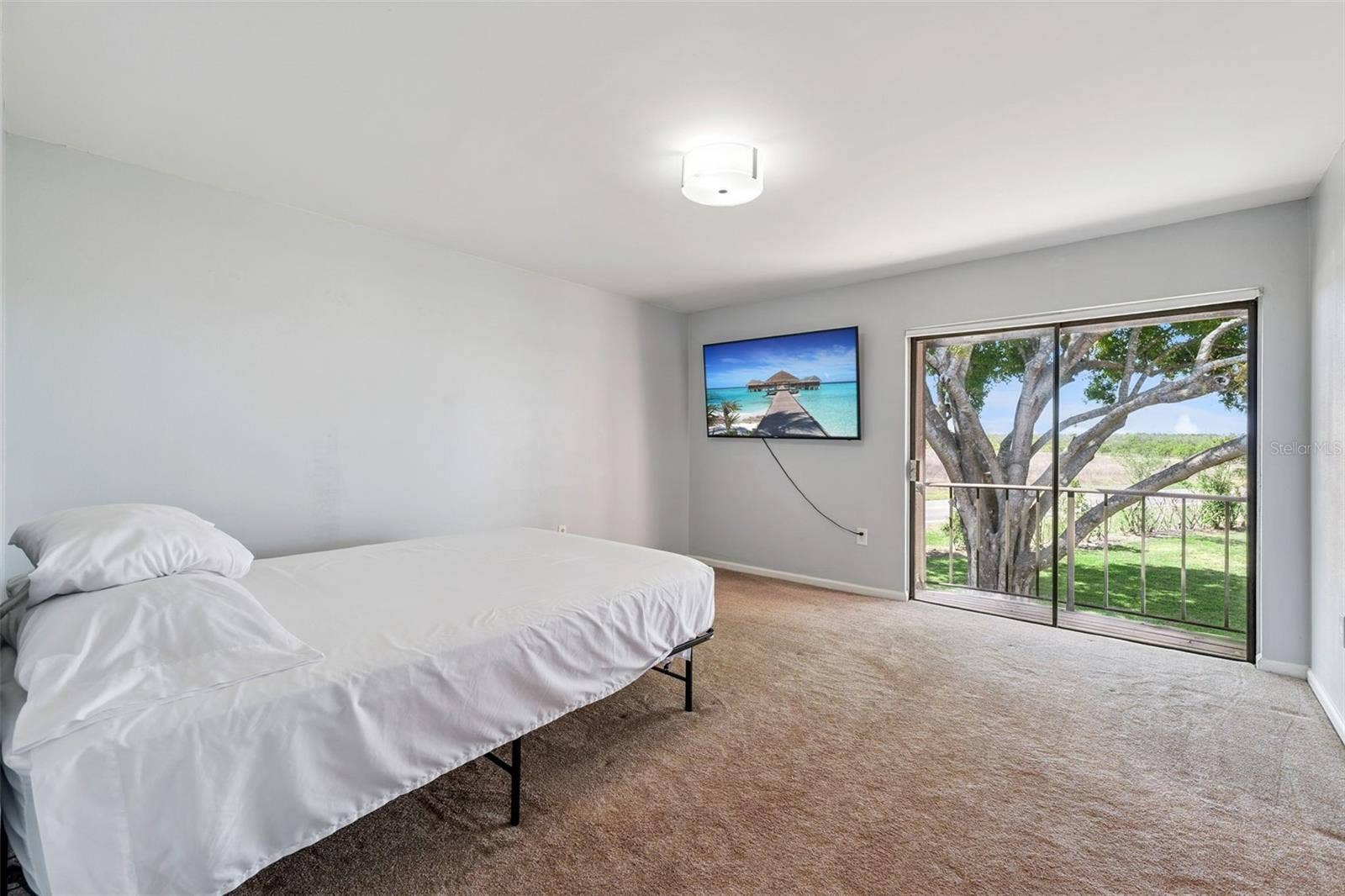 210 LA CASA, #210, Lake Wales, FL 33898 Primary bedroom with view of grounds