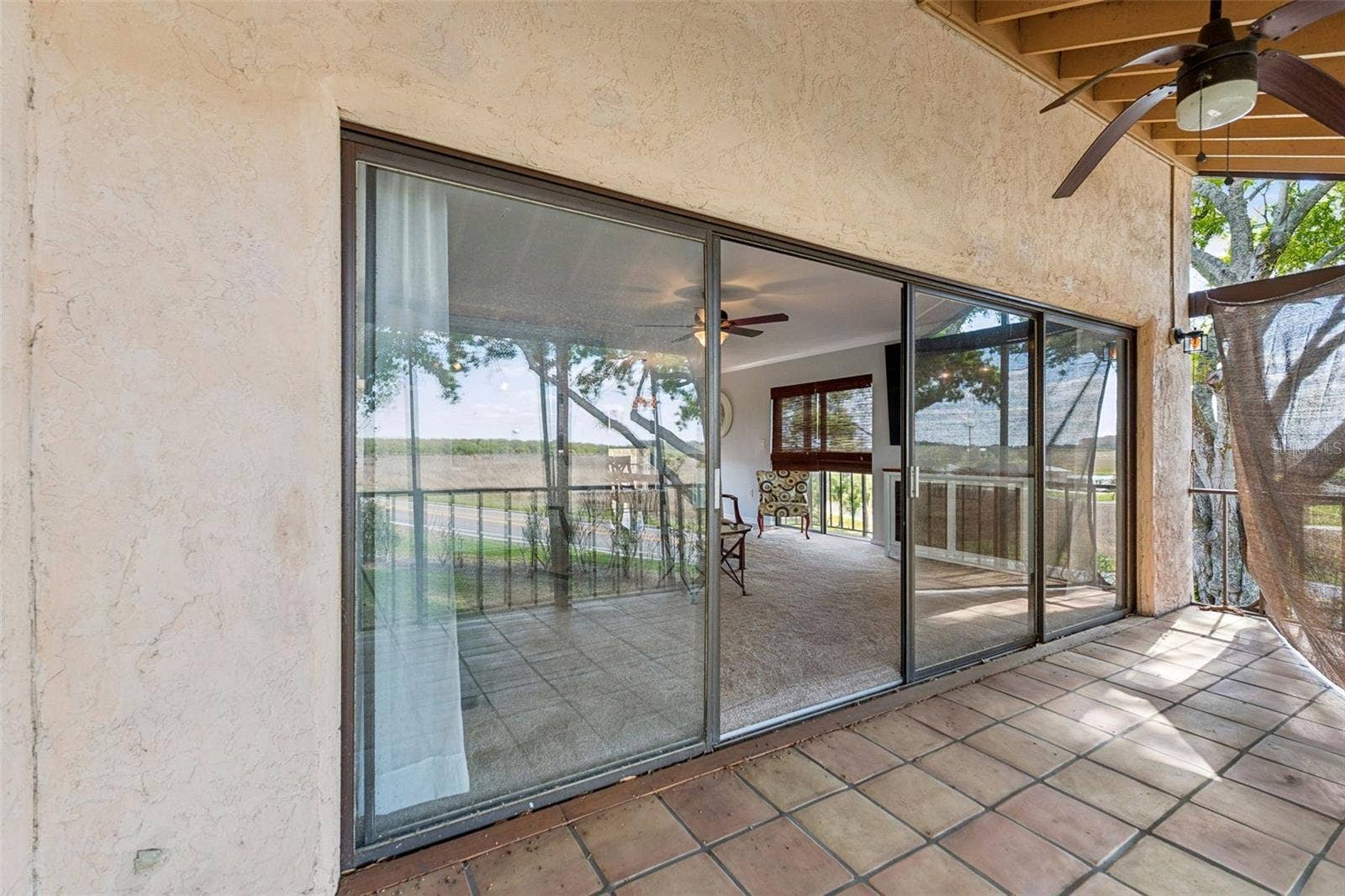 210 LA CASA, #210, Lake Wales, FL 33898 Double sliding doors open onto porch with tile floor