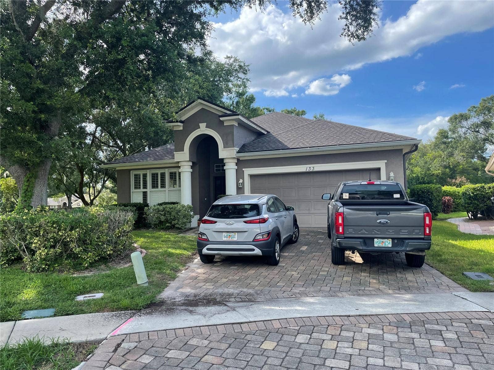 133 REDTAIL PLACE, Winter Springs, FL 32708 front of house - 2 car garage