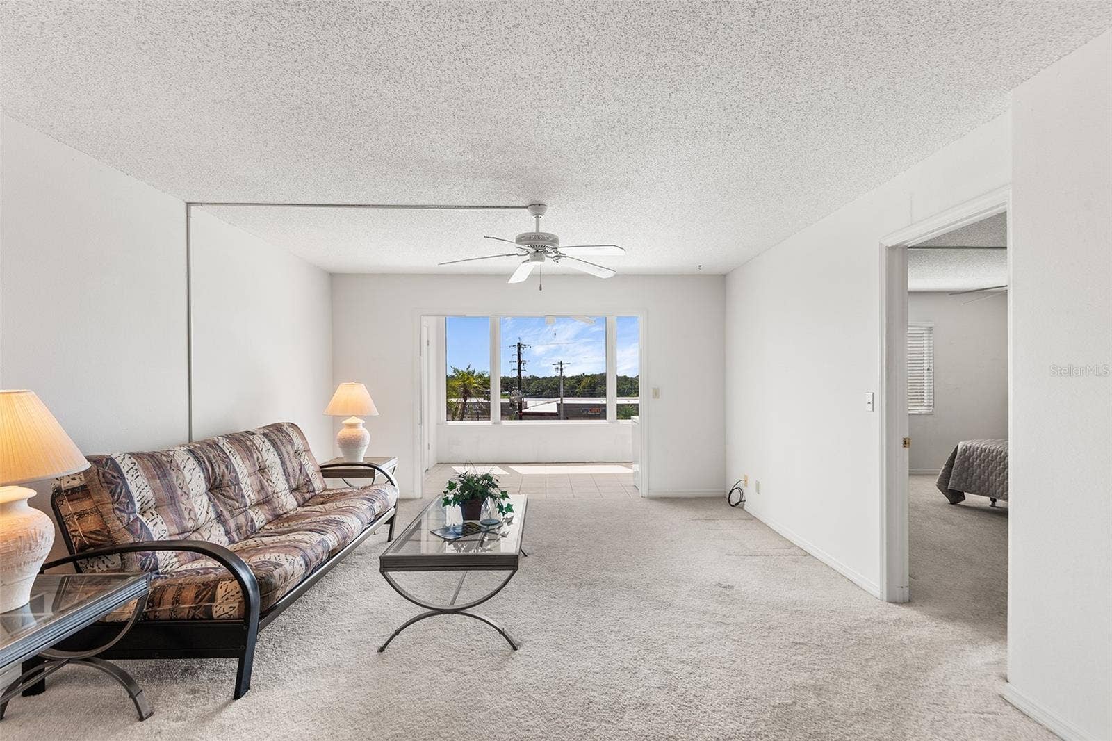 1776 6TH STREET NW, #304, Winter Haven, FL 33881 LIVING ROOM. PRIMARY BEDROOM TO THE RIGHT