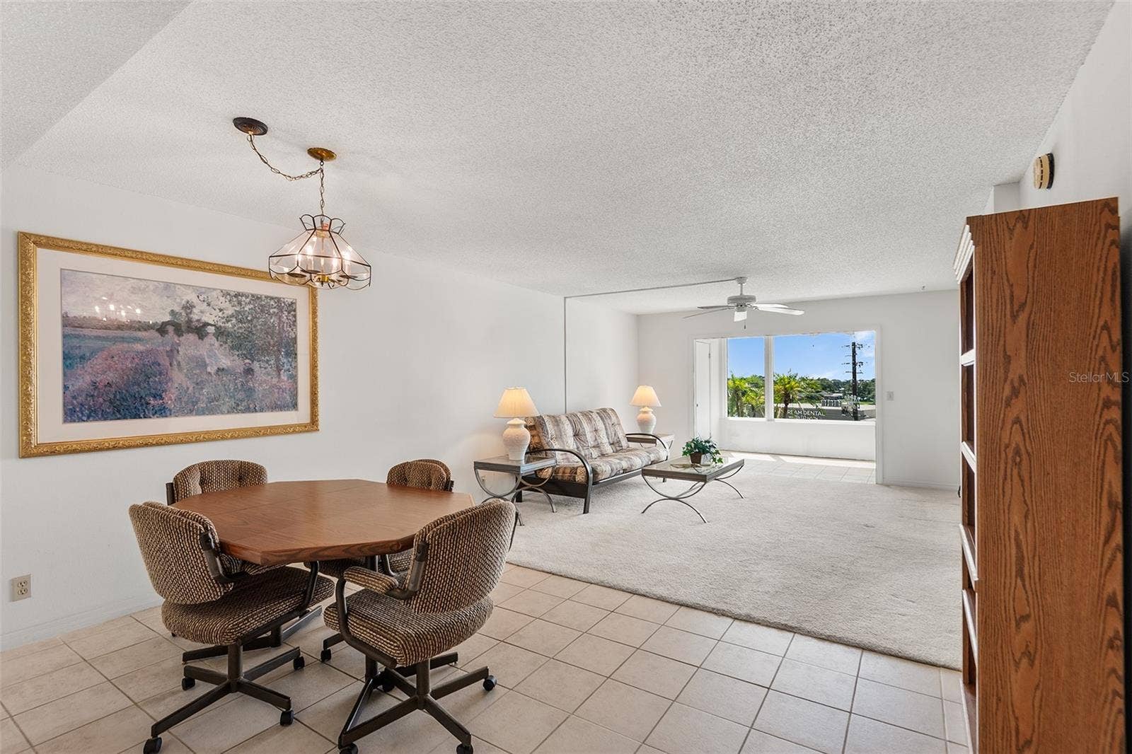 1776 6TH STREET NW, #304, Winter Haven, FL 33881 DINING AREA . VIEW TOWARDS LIVING ROOM AND BONUS ROOM
