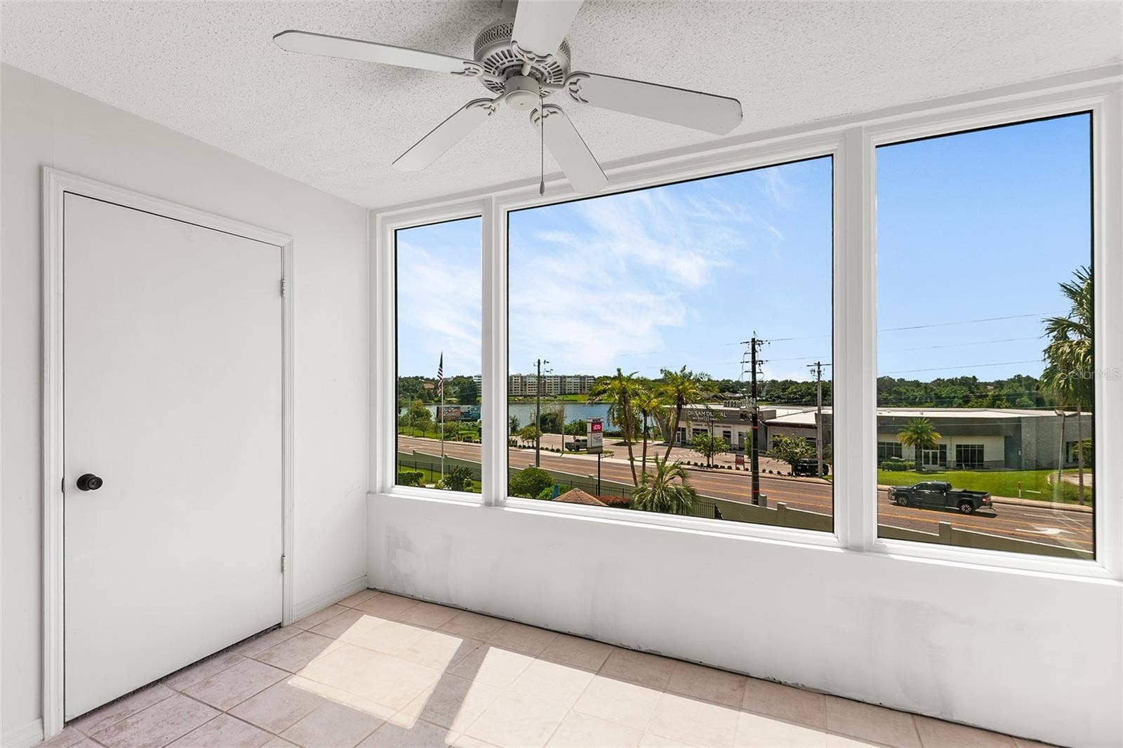 1776 6TH STREET NW, #304, Winter Haven, FL 33881 BONUS ROOM WITH VIEW TOWARDS LAKE. STORAGE CLOSET ON LEFT
