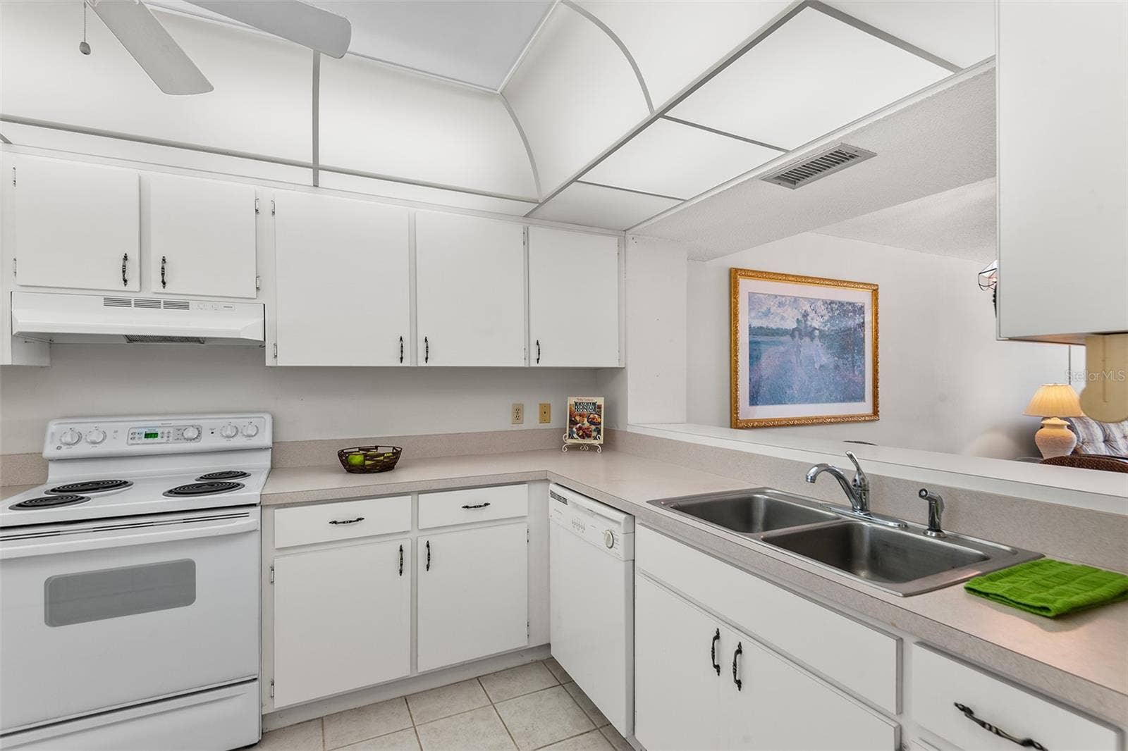 1776 6TH STREET NW, #304, Winter Haven, FL 33881 KITHEN WITH PASS THRU TO DINING AREA