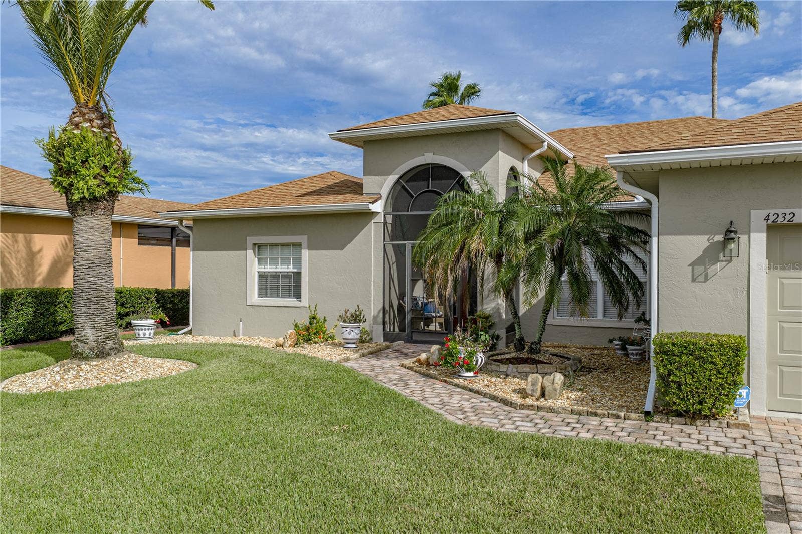 4232 DORNOCH DRIVE, Lake Wales, FL 33859 The stone mulch, paver walk and driveway add to the curb appeal.